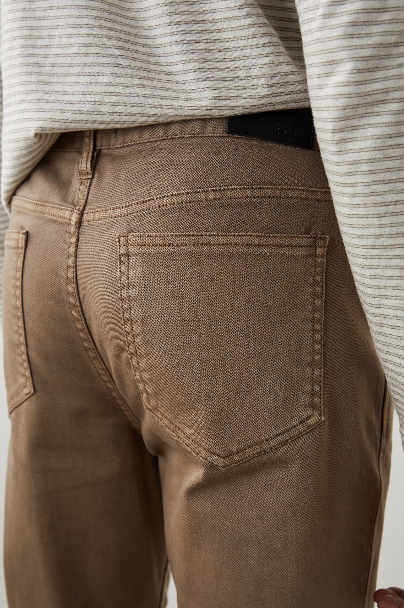 Carver Pants with Belt Loops, Two Front Pockets plus a Coin Pocket and Two Back Patch Pockets in Cacao Colorway - Back View Featured on Model