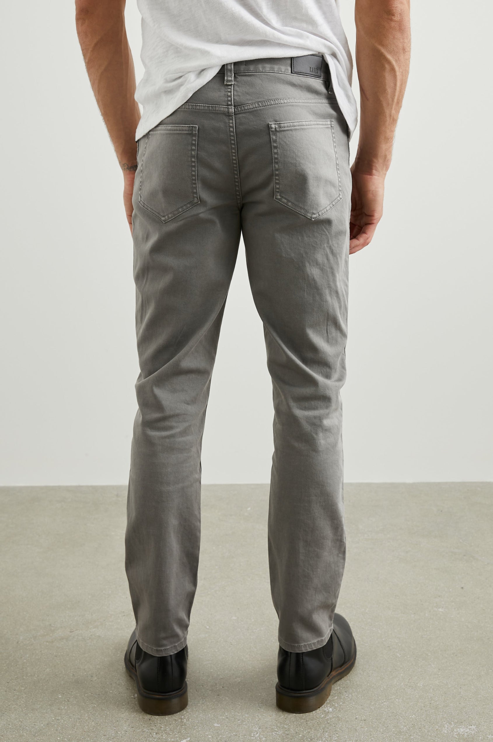 Carver Pants with Belt Loops, Two Front Pockets plus a Coin Pocket and Two Back Patch Pockets in Faded Grey Colorway - Back View Featured on Model