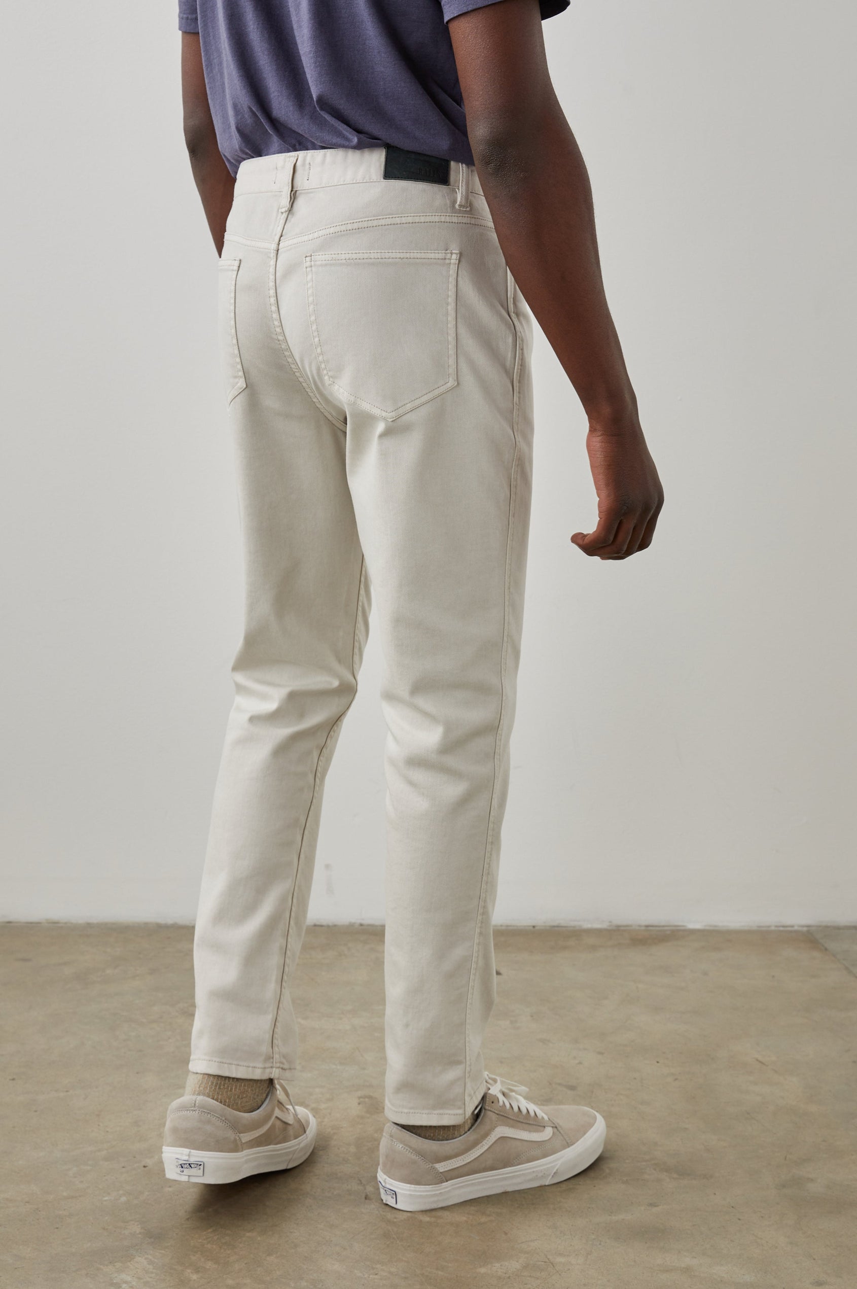 Carver Pants with Belt Loops, Two Front Pockets plus a Coin Pocket and Two Back Patch Pockets in Stone Colorway - Back View Featured on Model