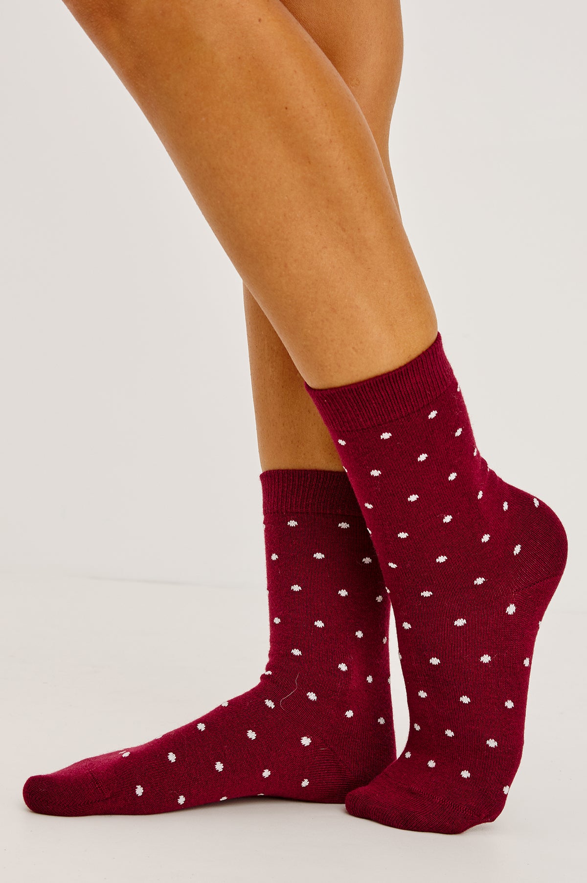 Cashmere Crew Socks in Soft Cotton-Cashmere Blend With Ribbed Cuffs in Cardinal Polka Dot Colorway - Upper Body Front View Featured on Model.