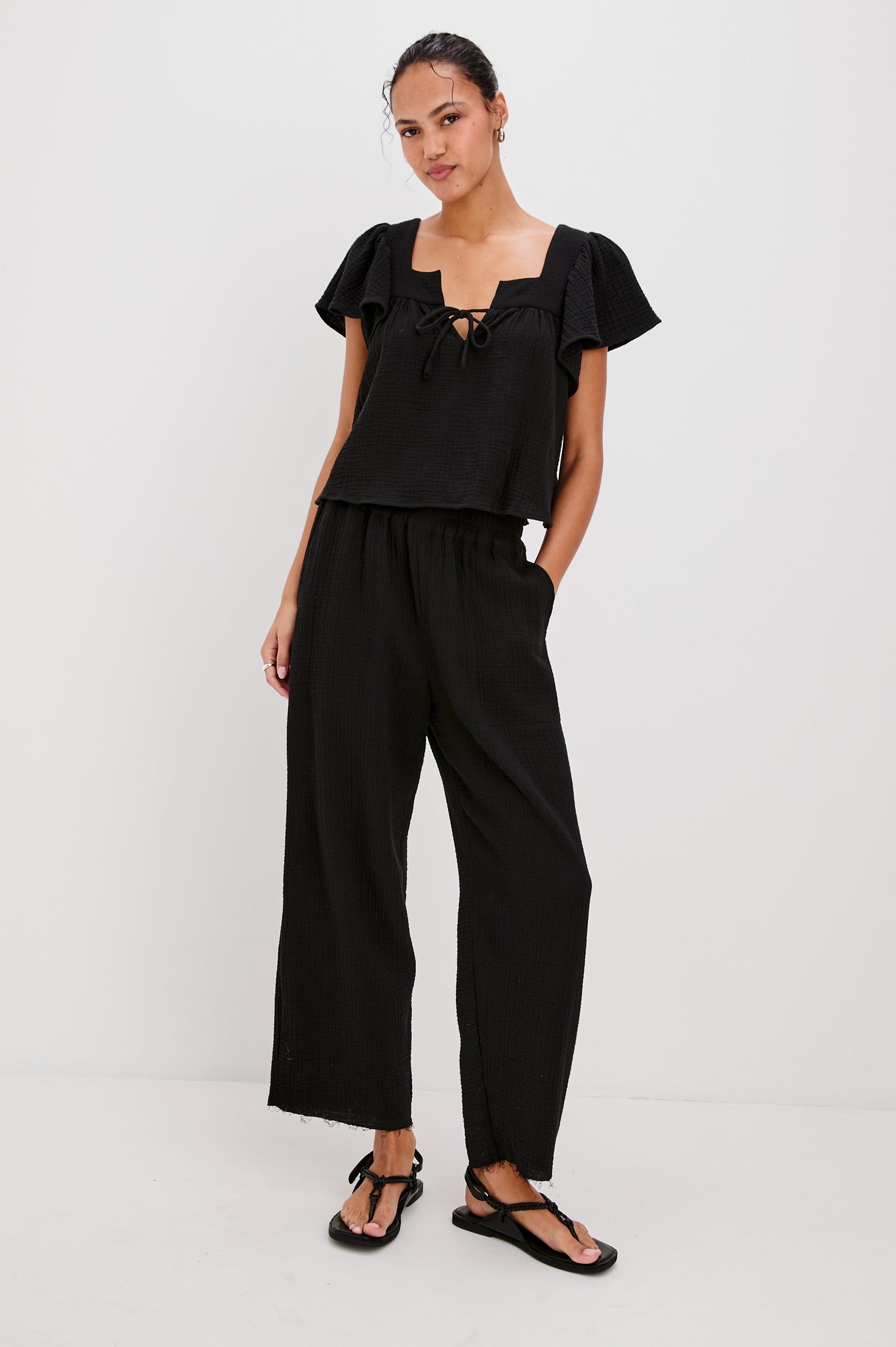 Casie Square Neck Top with Short Flutter Sleeves, V-Cut Center Front with Self Tie in Black Colorway. Full Body Front View Shown on Model.