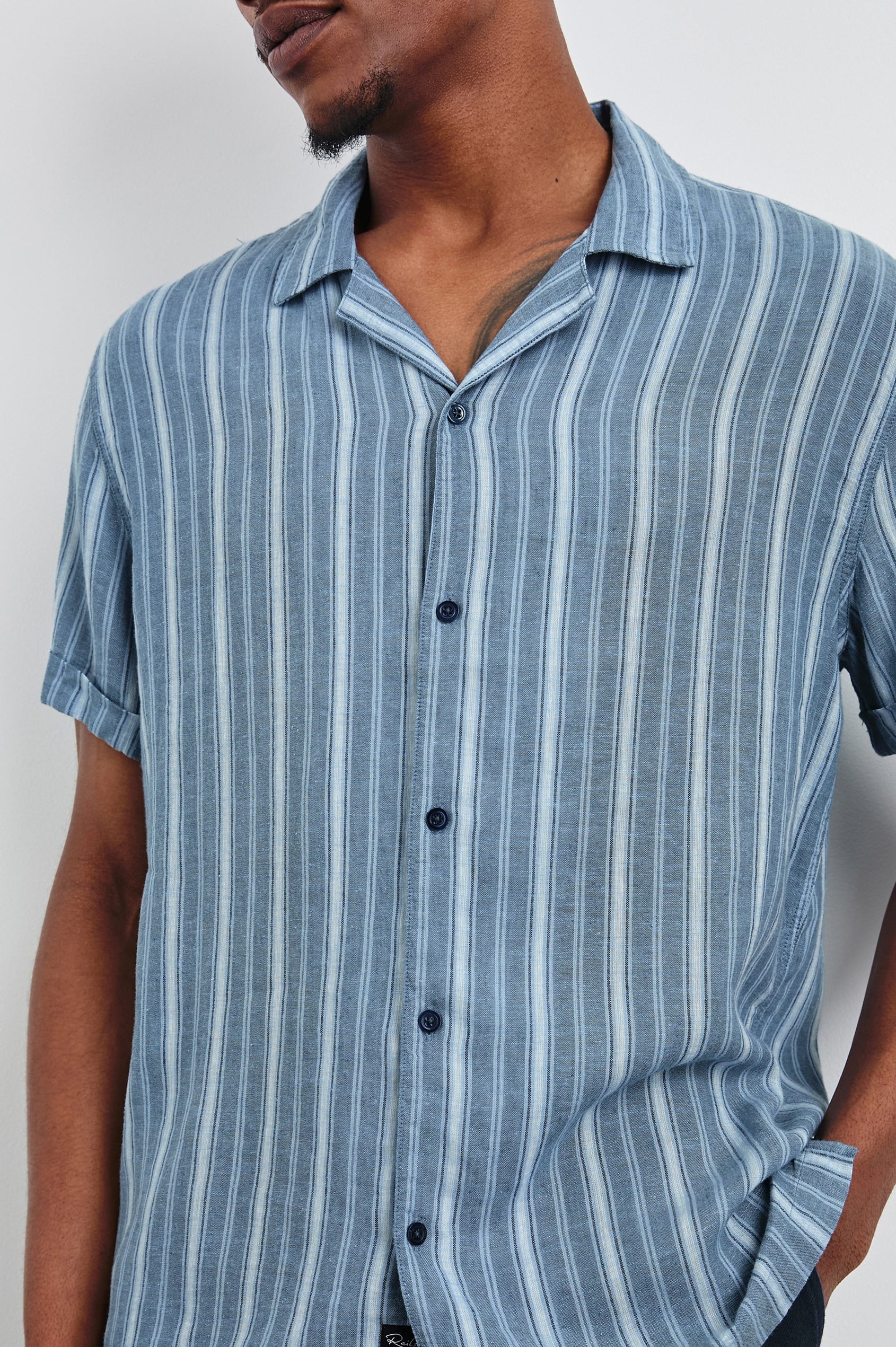 Cayman short sleeve shirt with contrast front buttons in Coastal Blue Stripe - close up of details