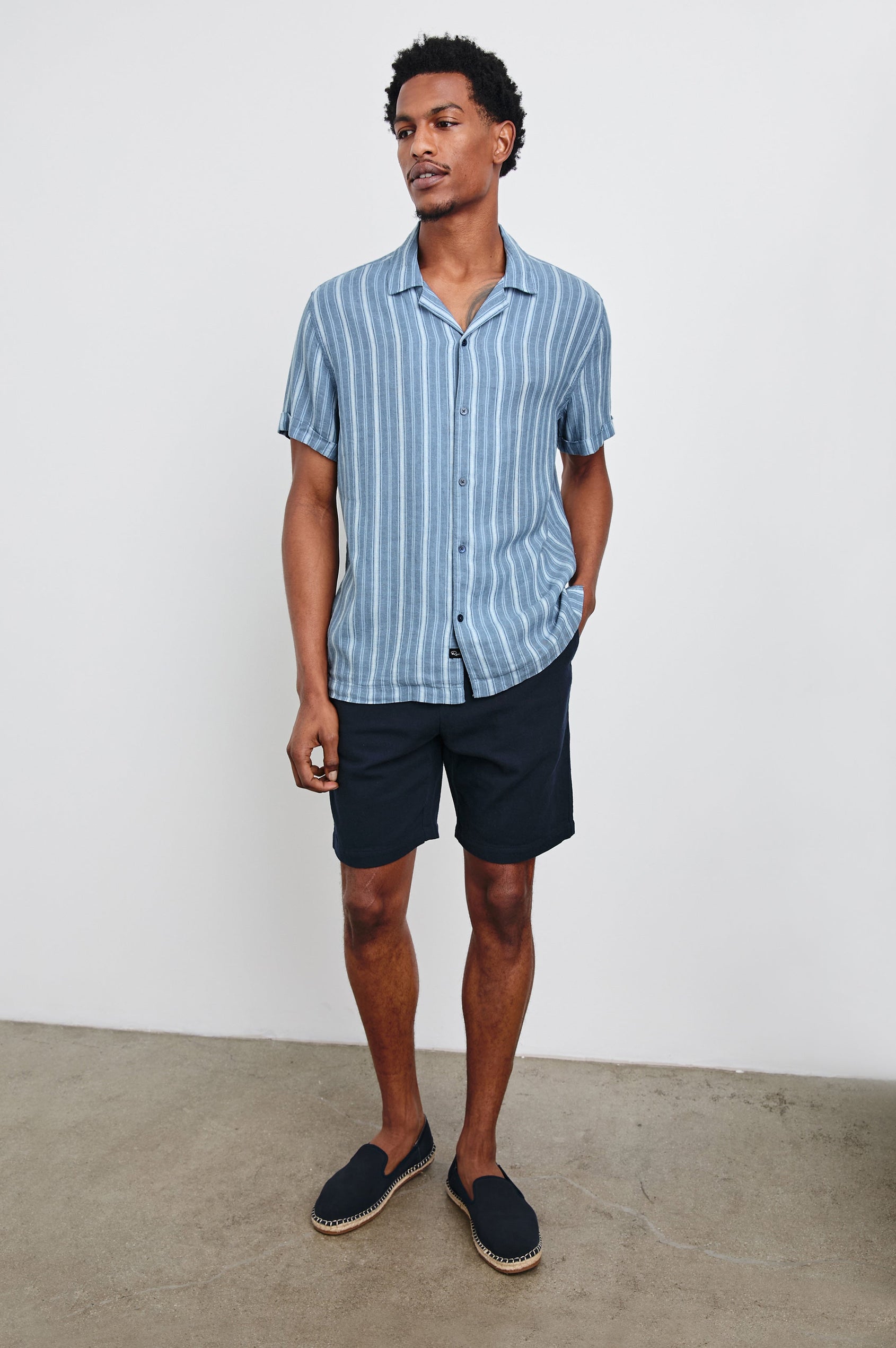 Cayman short sleeve shirt with contrast front buttons in Coastal Blue Stripe - full body front view on model