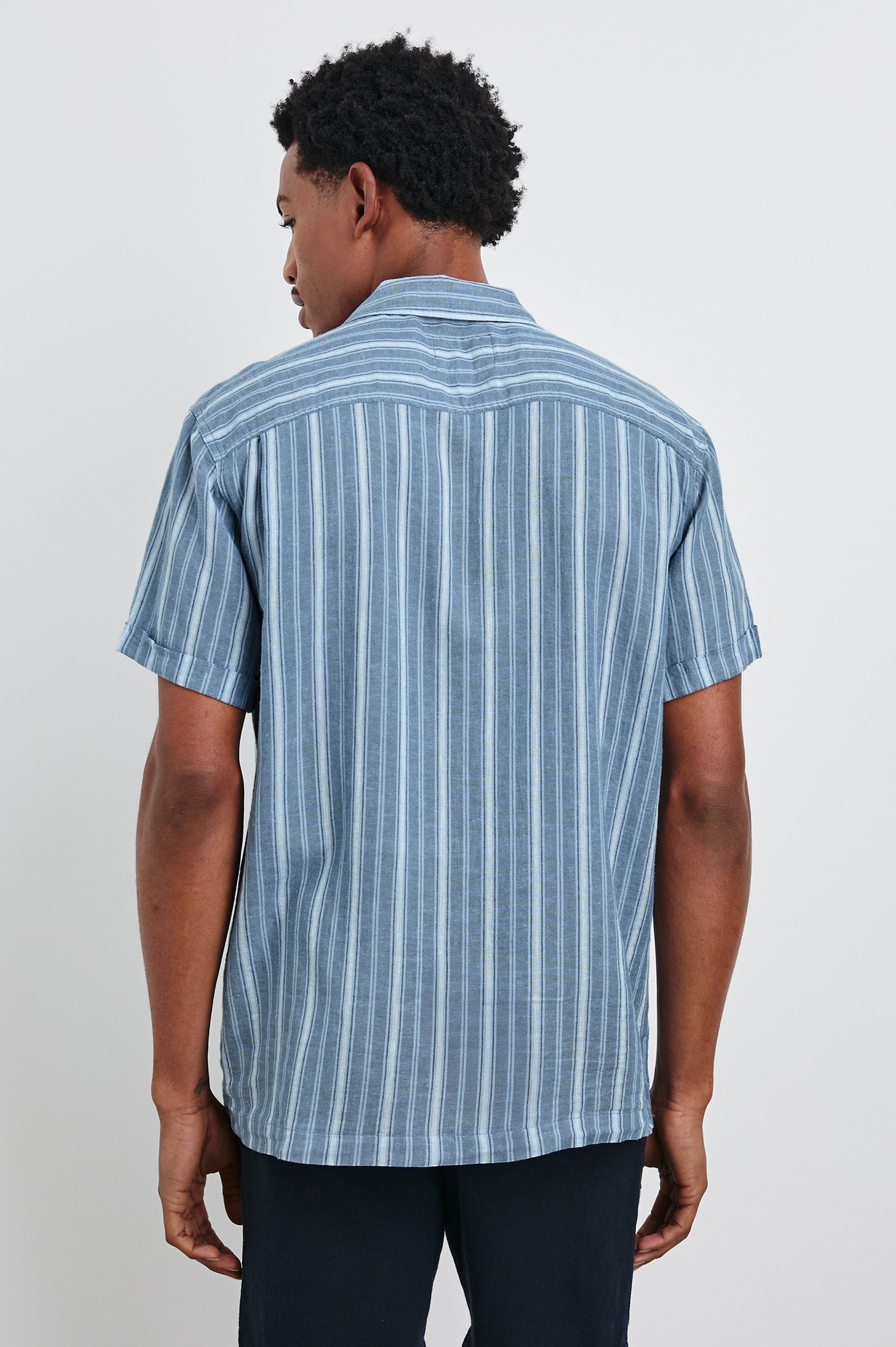 Cayman short sleeve shirt with contrast front buttons in Coastal Blue Stripe - back view on model
