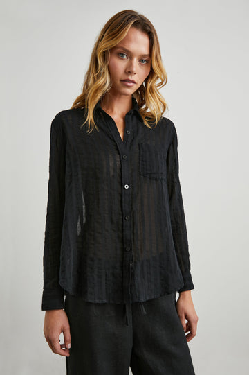 Charli Long-Sleeve Button up with a Chest Patch Pocket in Black Shadow Stripe Colorway, with Vertical Solid and Gauzy Black Stripes  - Front View Featured on Model