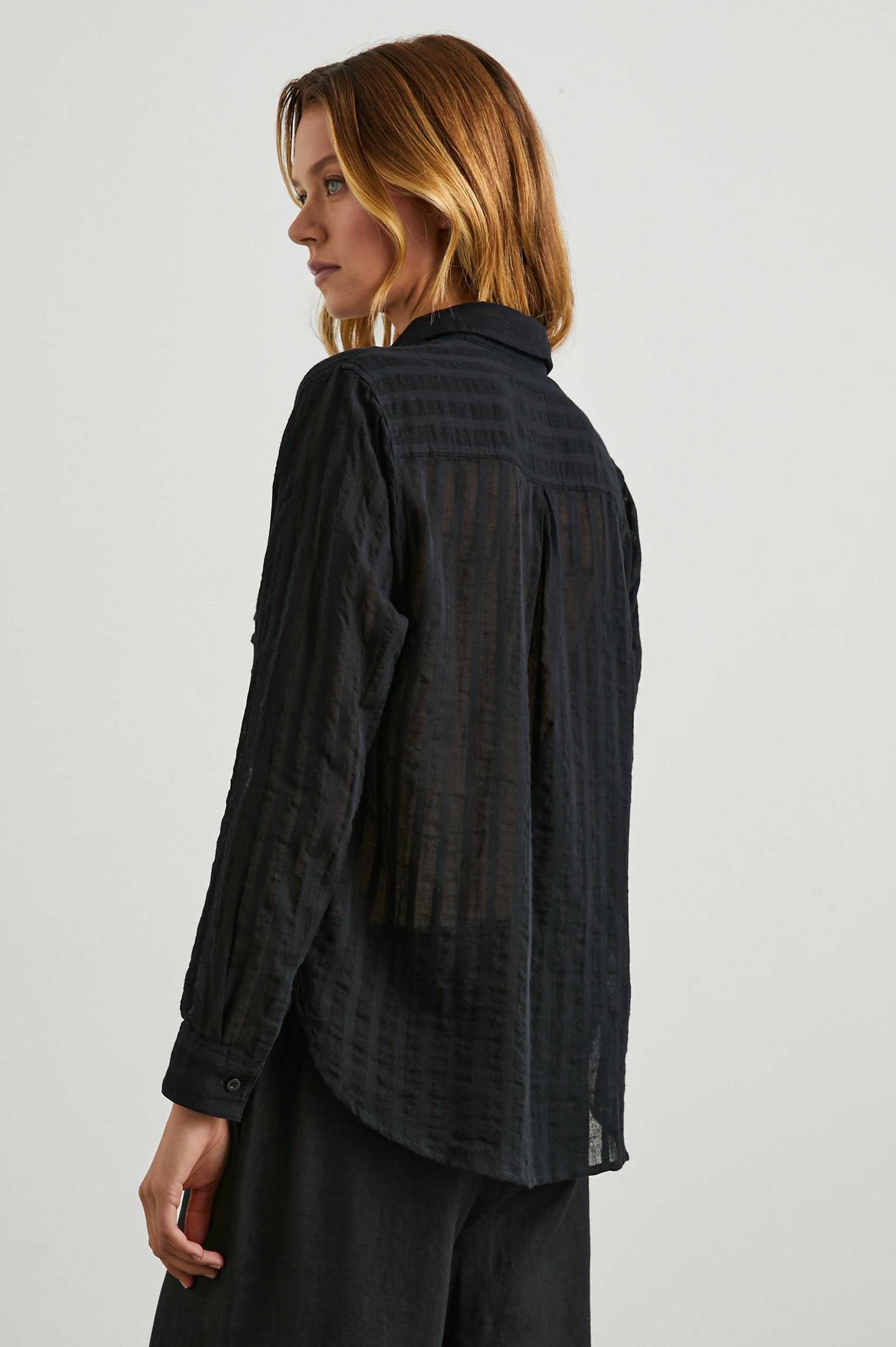 Charli Long-Sleeve Button up with a Chest Patch Pocket in Black Shadow Stripe Colorway, with Vertical Solid and Gauzy Black Stripes  - Back View Featured on Model
