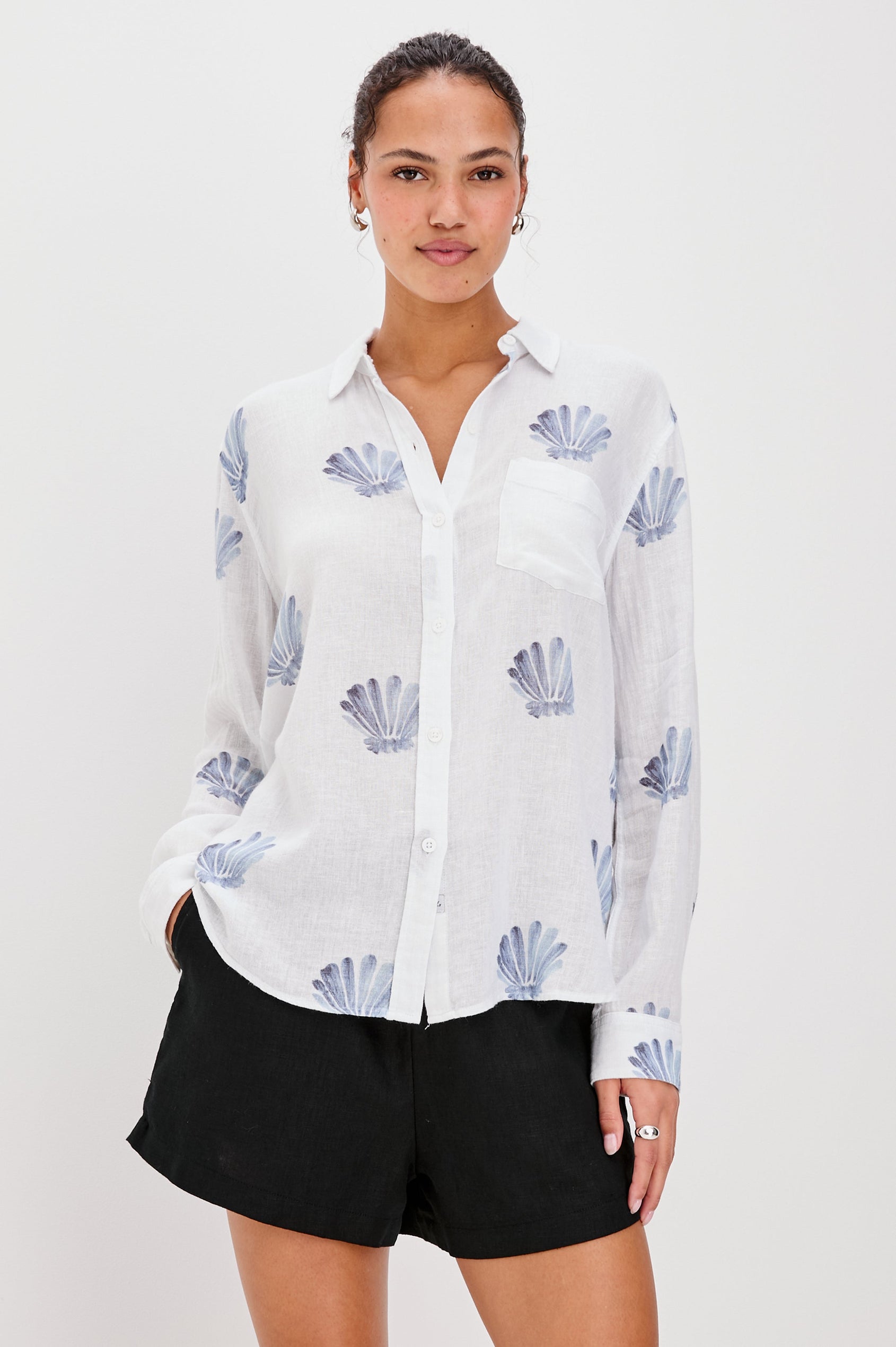Charlie Collared Button Down Shirt with Long Sleeves and a Chest Pocket in Blue Seashells Colorway. Front View Shown on Model.