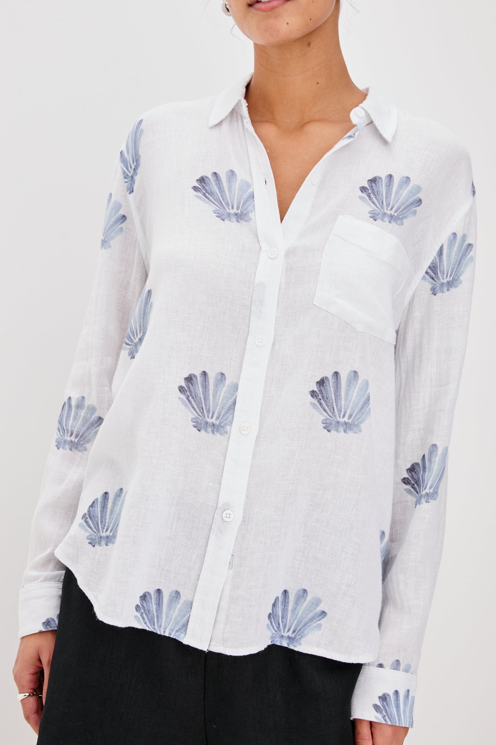 Charlie Collared Button Down Shirt with Long Sleeves and a Chest Pocket in Blue Seashells Colorway. Front View Shown on Model.