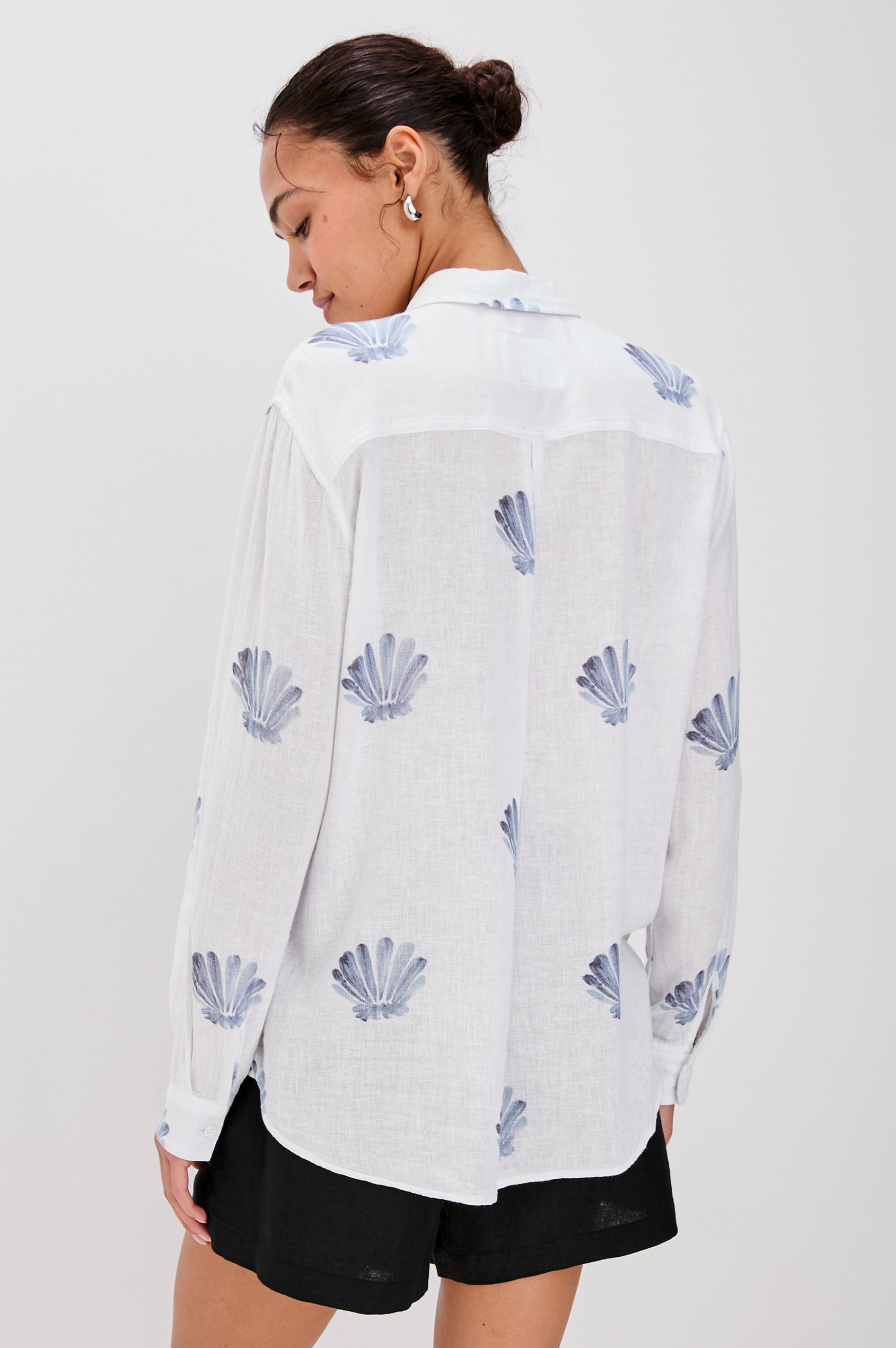 Charlie Collared Button Down Shirt with Long Sleeves and a Chest Pocket in Blue Seashells Colorway. Back View Shown on Model.