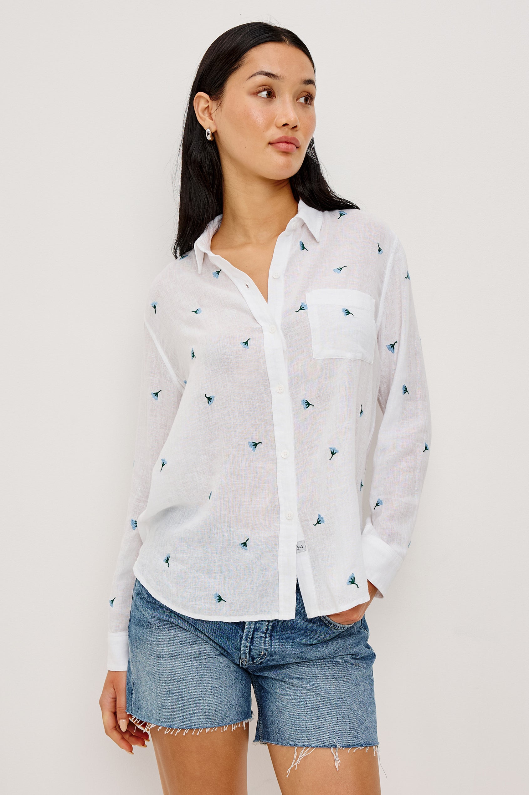 Charli Button-Up Shirt in Eco-Friendly Linen Blend With Collar Long Sleeves Single Chest Patch Pocket in Bluebell Carnations Colorway - Upper Body Front View Featured on Model