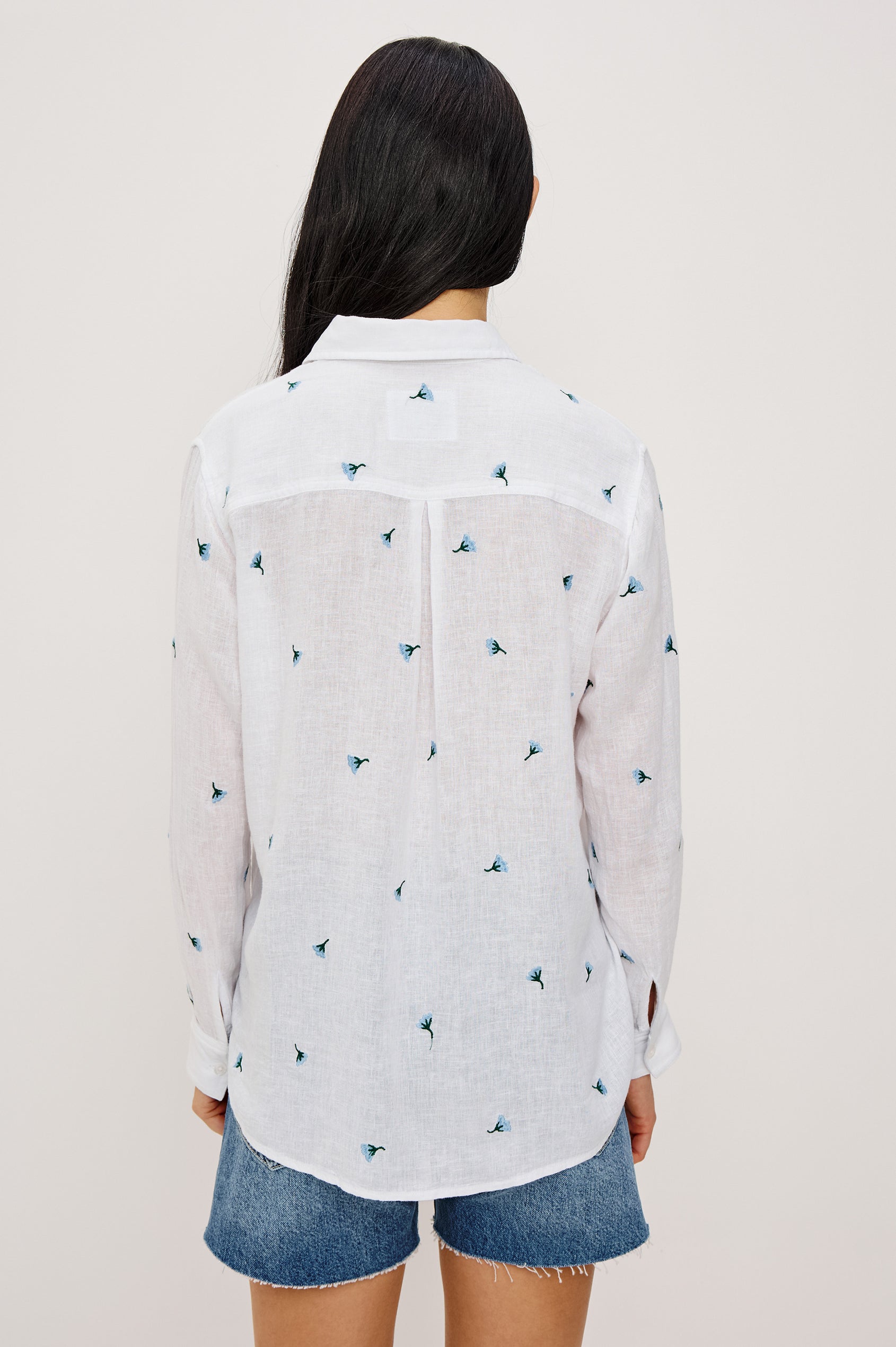 Charli Button-Up Shirt in Eco-Friendly Linen Blend With Collar Long Sleeves Single Chest Patch Pocket in Bluebell Carnations Colorway - Upper Body Back View Featured on Model