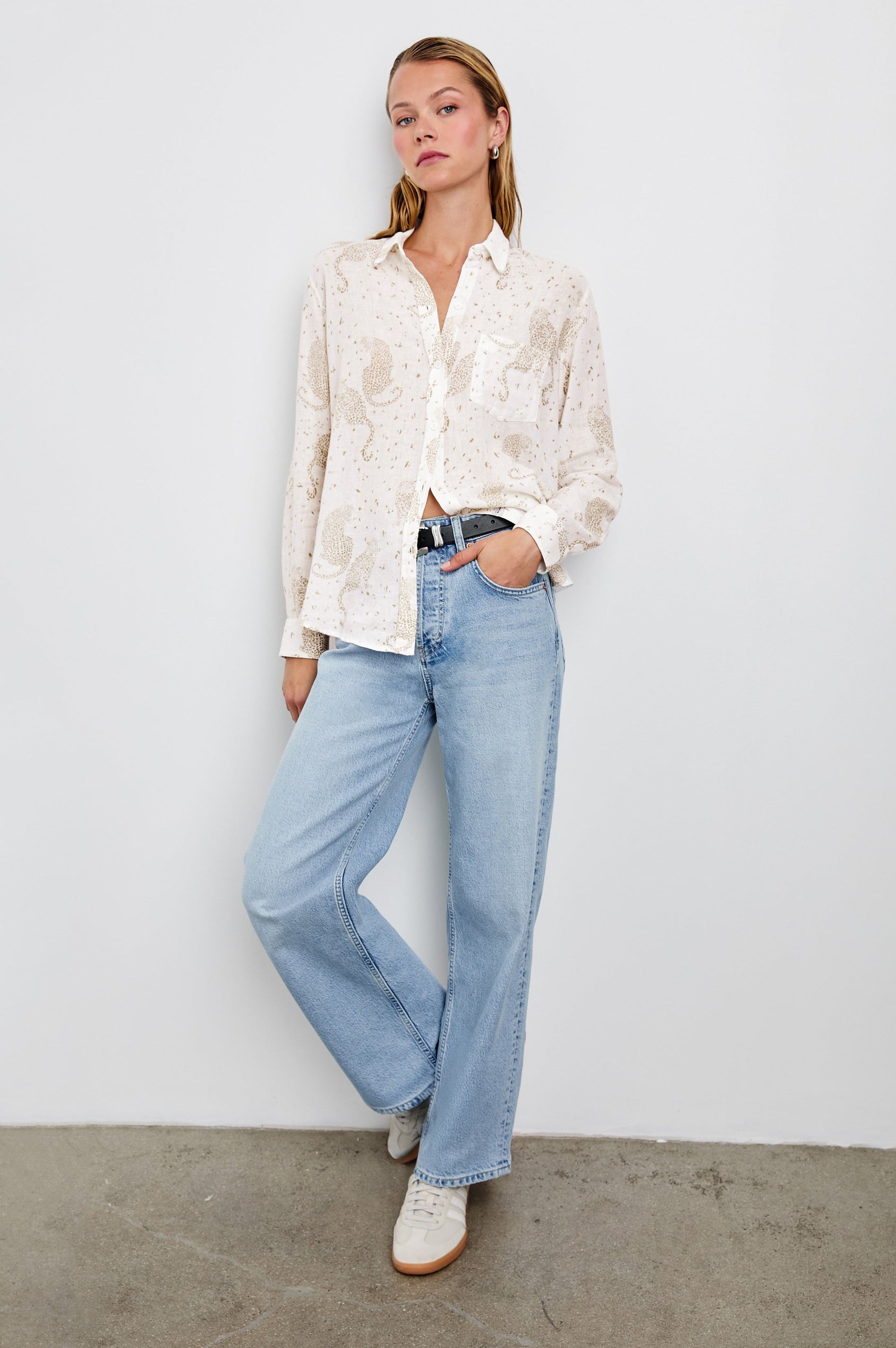 Charli Long-Sleeve Button up with a Chest Patch Pocket in Cheetah Spots Colorway, with brown spots and cheetahs on cream - Front Full Body View Featured on Model