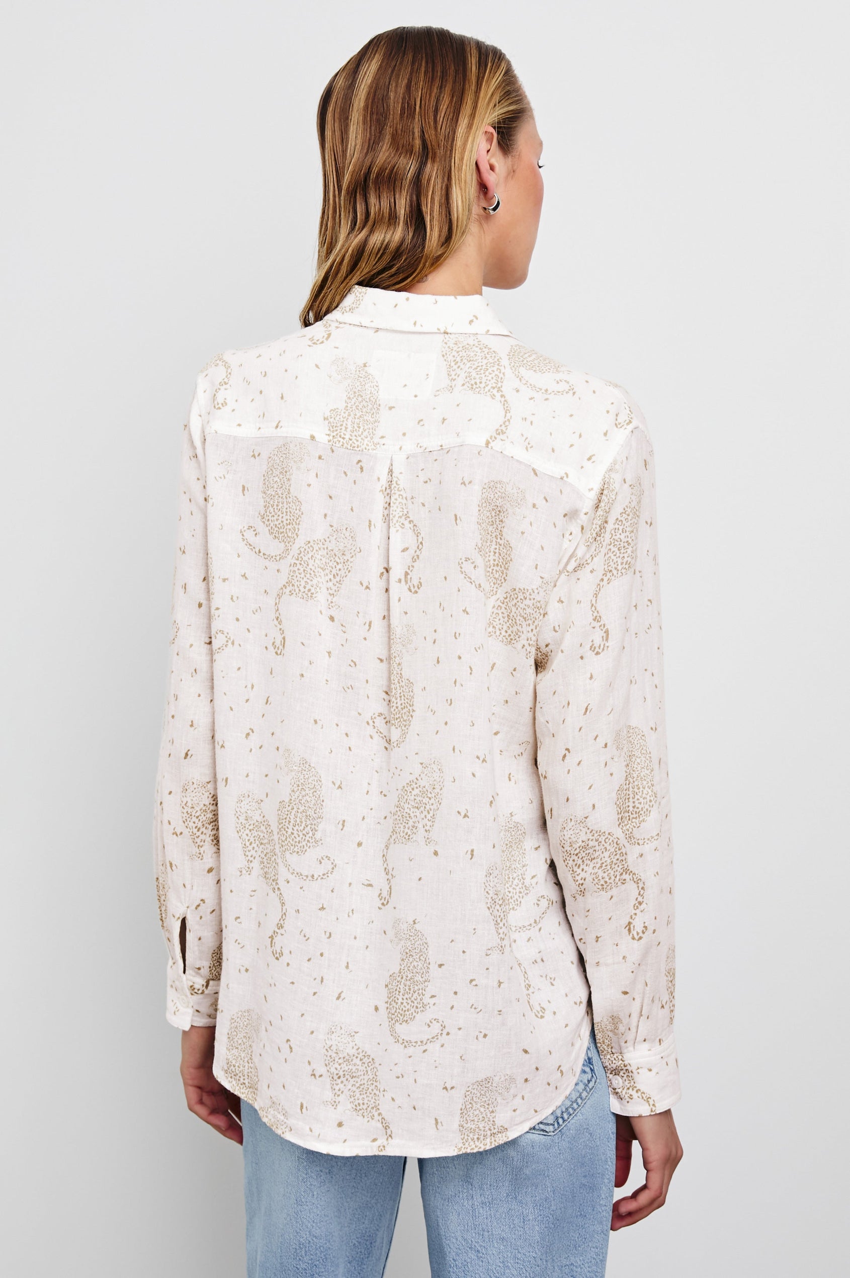 Charli Long-Sleeve Button up with a Chest Patch Pocket in Cheetah Spots Colorway, with brown spots and cheetahs on cream - Back View Featured on Model