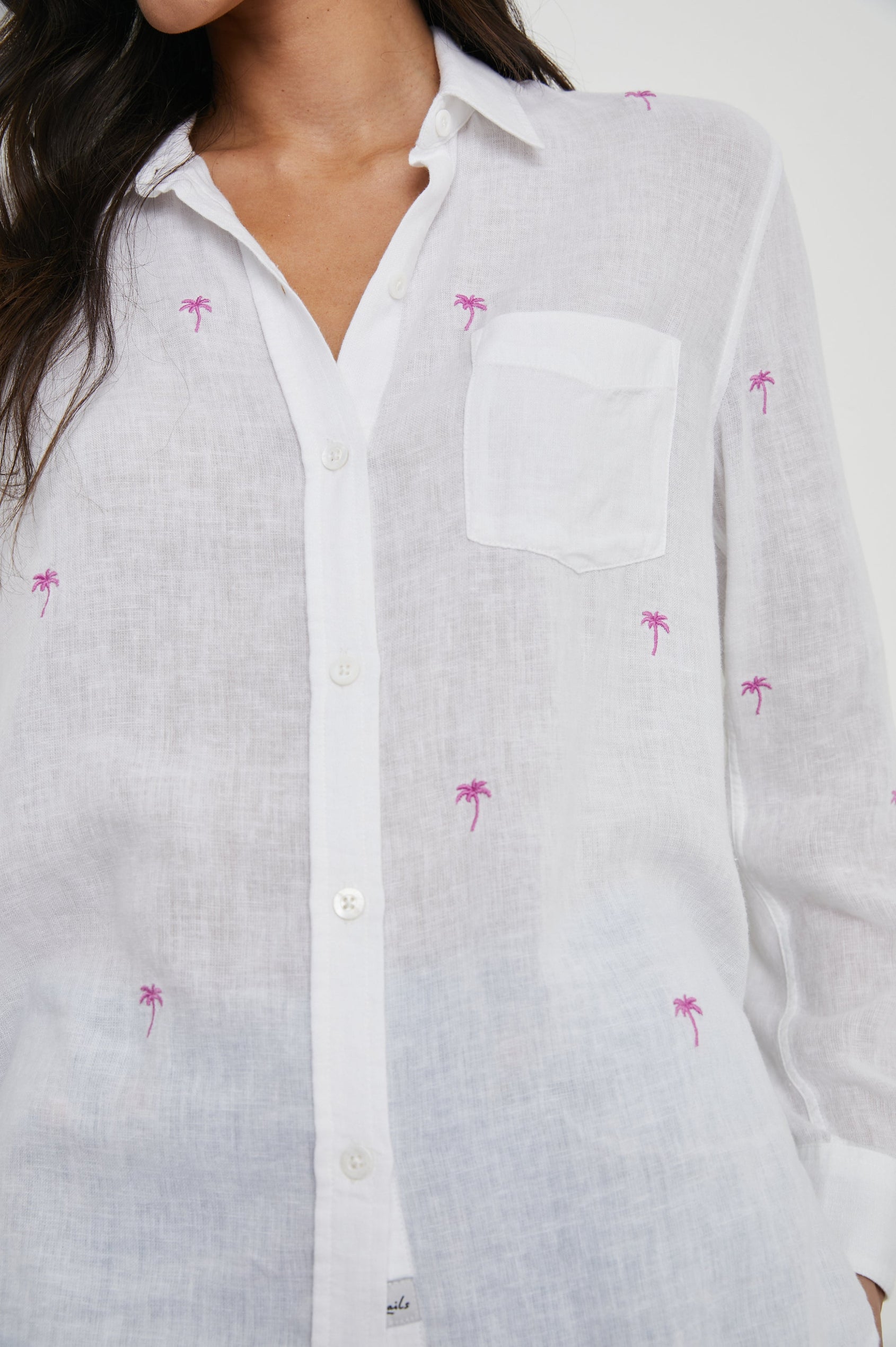 Charli Long-Sleeve Button up with a Chest Patch Pocket in Fuchsia Embroidered Palms Colorway, with small pink palm trees on ivory - Front View Featured on Model
