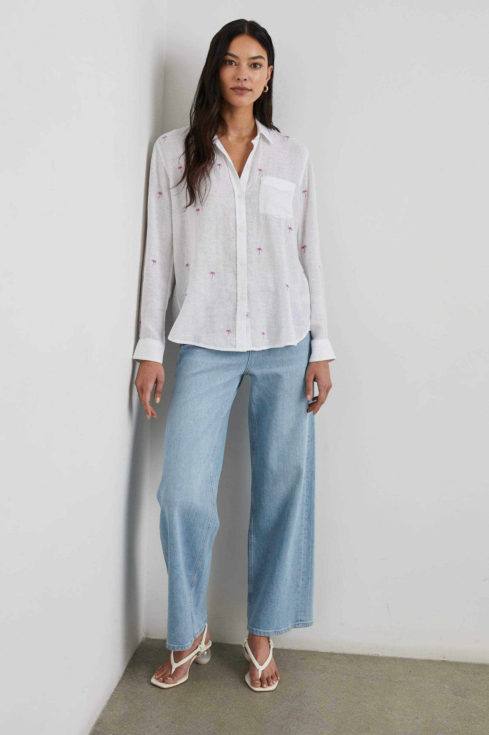 Charli Long-Sleeve Button up with a Chest Patch Pocket in Fuchsia Embroidered Palms Colorway, with small pink palm trees on ivory - Front Full Body View Featured on Model