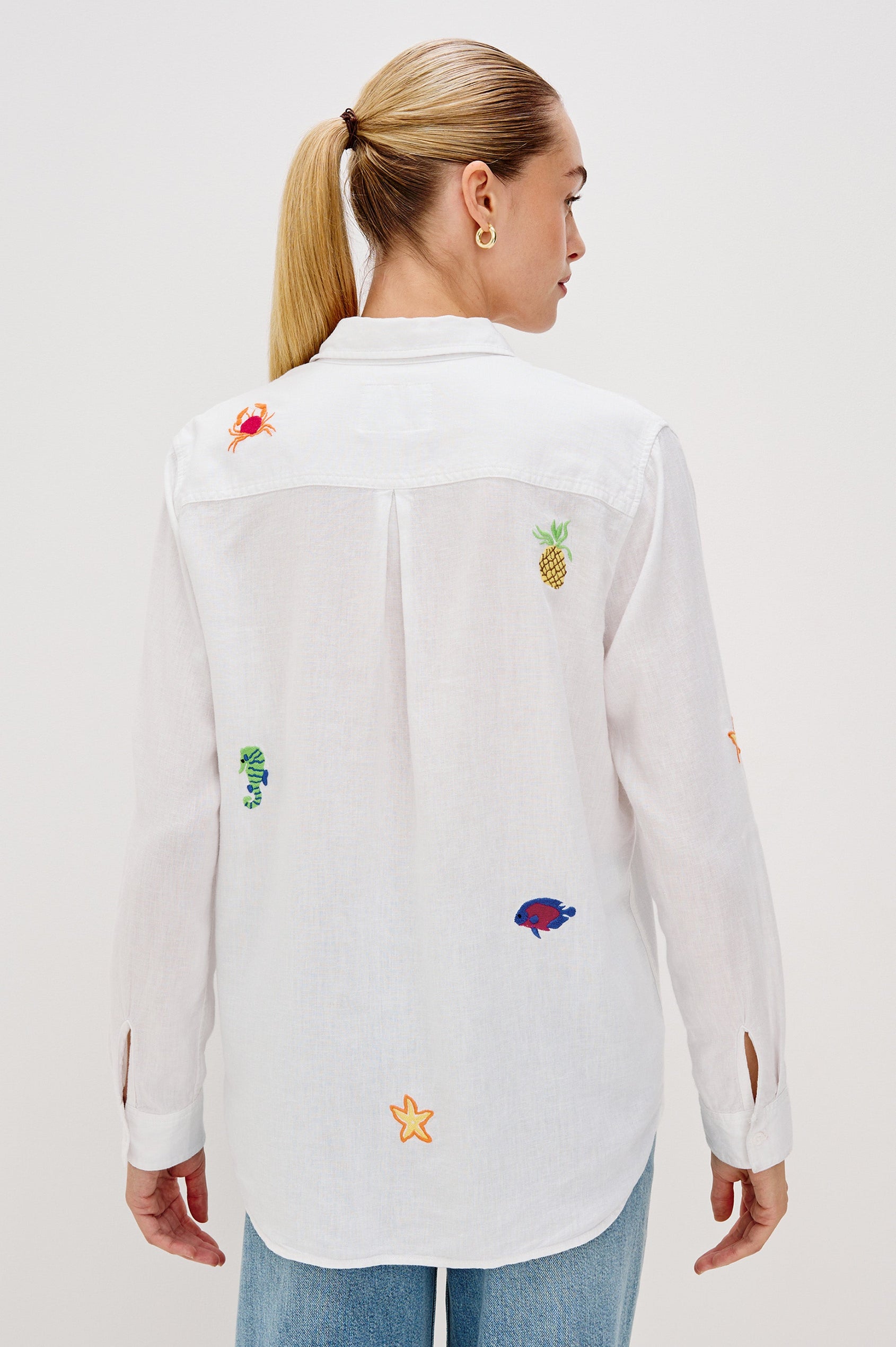 Charli Collared Button Front Shirt with Long Sleeves and a Front Chest Pocket and Scattered Embroidery All Over in Island Embroidery Colorway. Back View Shown on Model.
