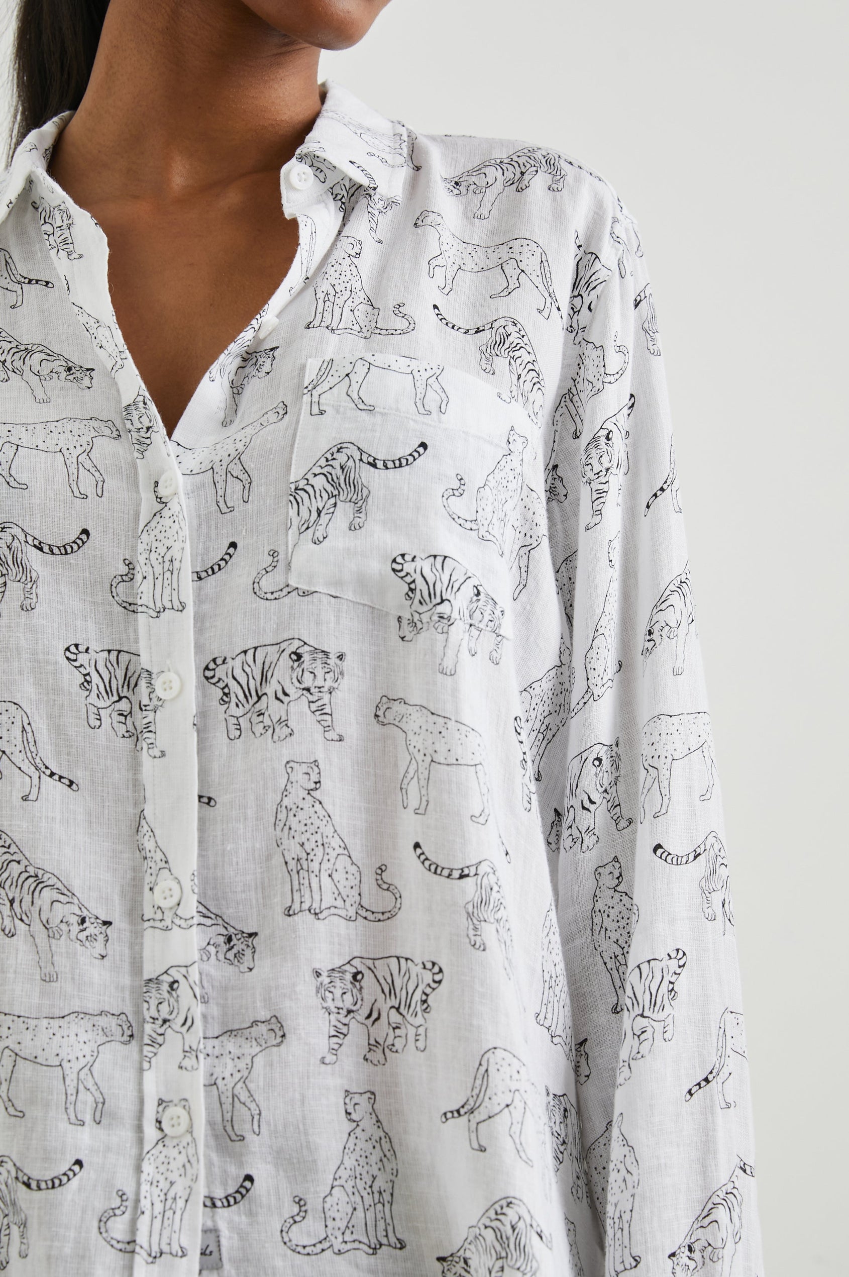 Charli Long-Sleeve Button up with a Chest Patch Pocket in Ivory Jungle Cats Colorway, with black jungle cats on ivory  - Front View Featured on Model