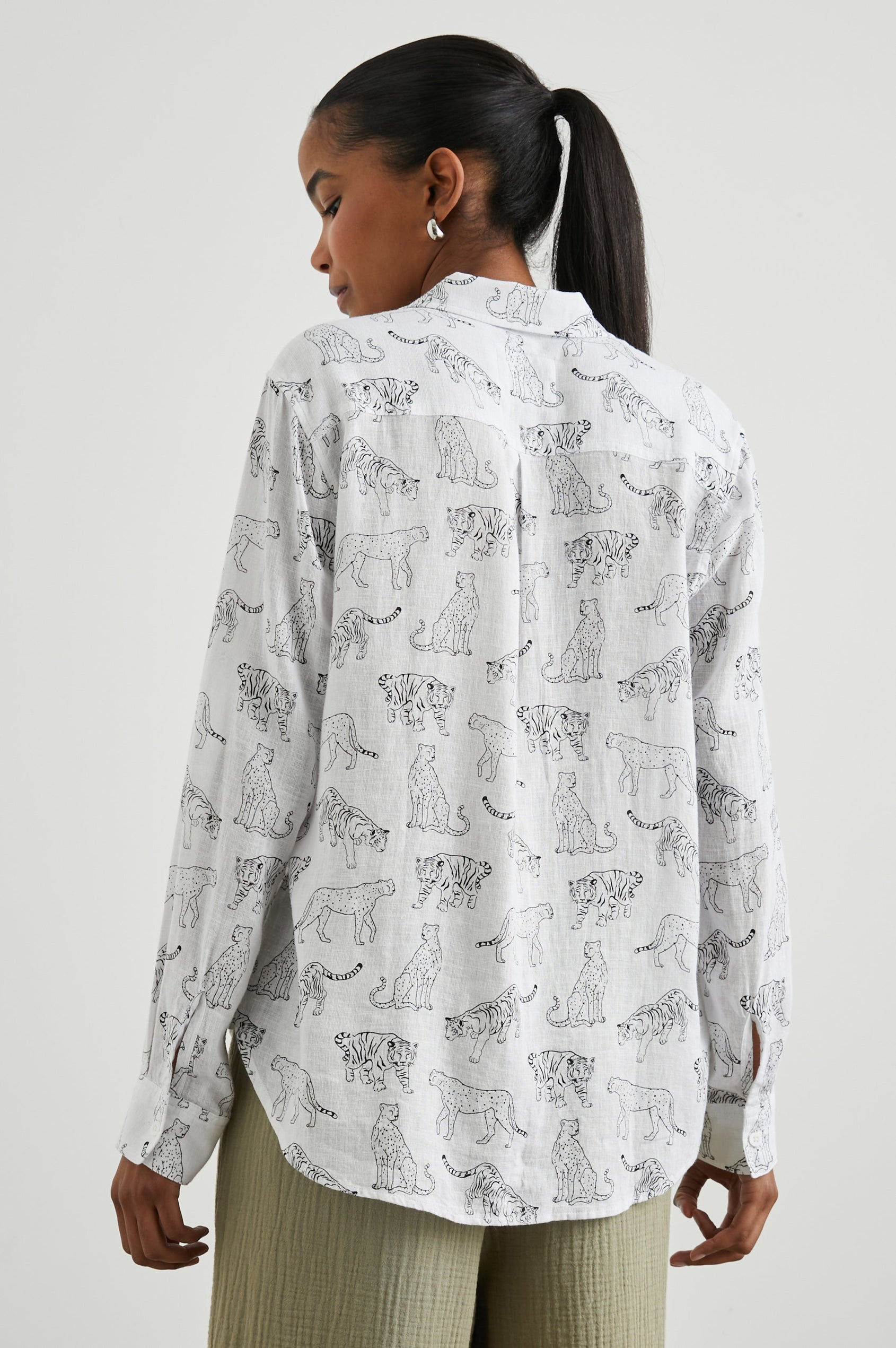 Charli Long-Sleeve Button up with a Chest Patch Pocket in Ivory Jungle Cats Colorway, with black jungle cats on ivory  - Front View Featured on Model