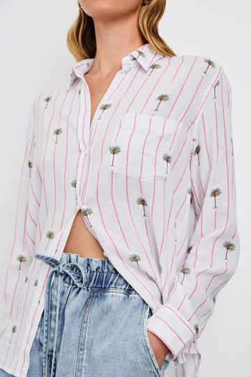 Charli Long-Sleeve Button up with a Chest Patch Pocket in Pink Palm Colorway, with pink vertical stripes dashed with palm trees on ivory  - Front View Featured on Model