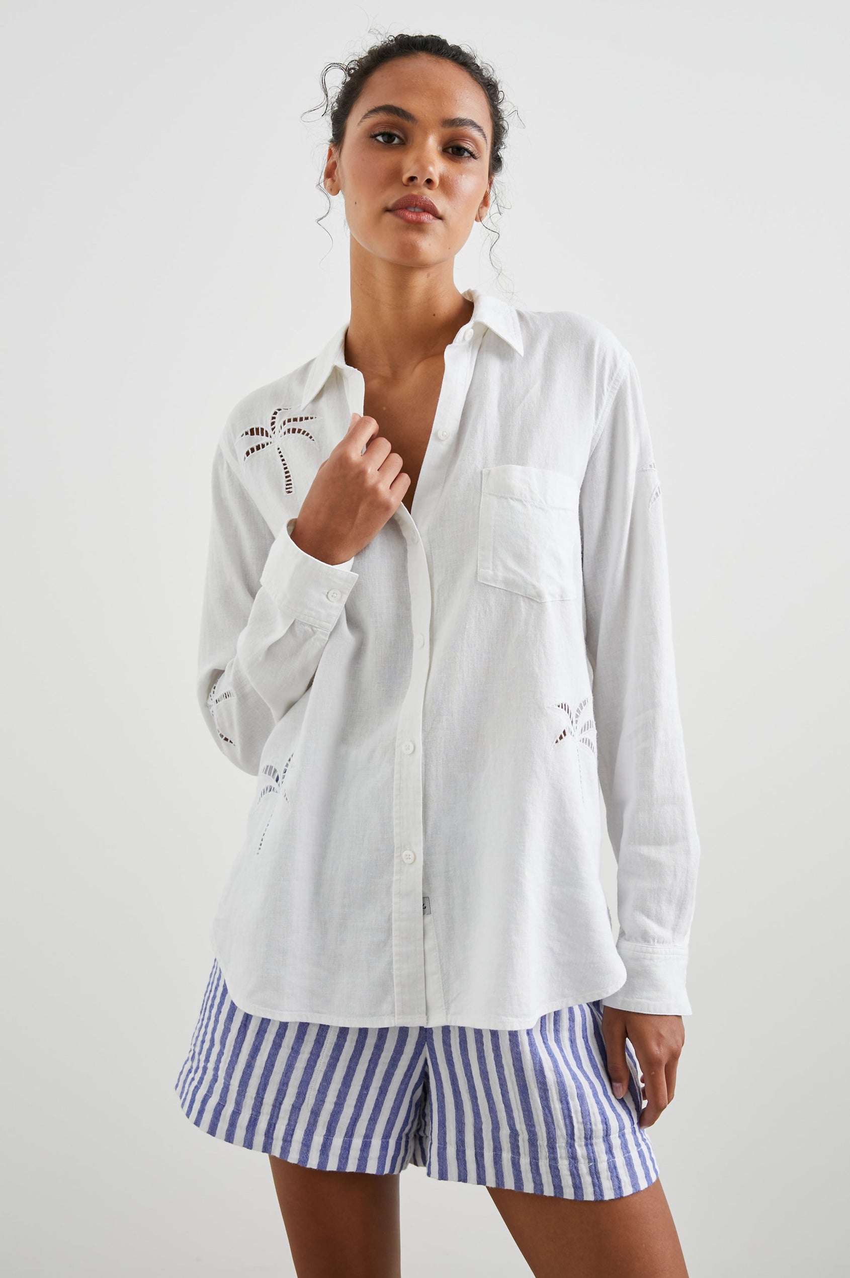 Charli Long-Sleeve Button up with a Chest Patch Pocket in White Palm Tree Eyelet Colorway, with eyelet Palm Trees on white - Front View Featured on Model