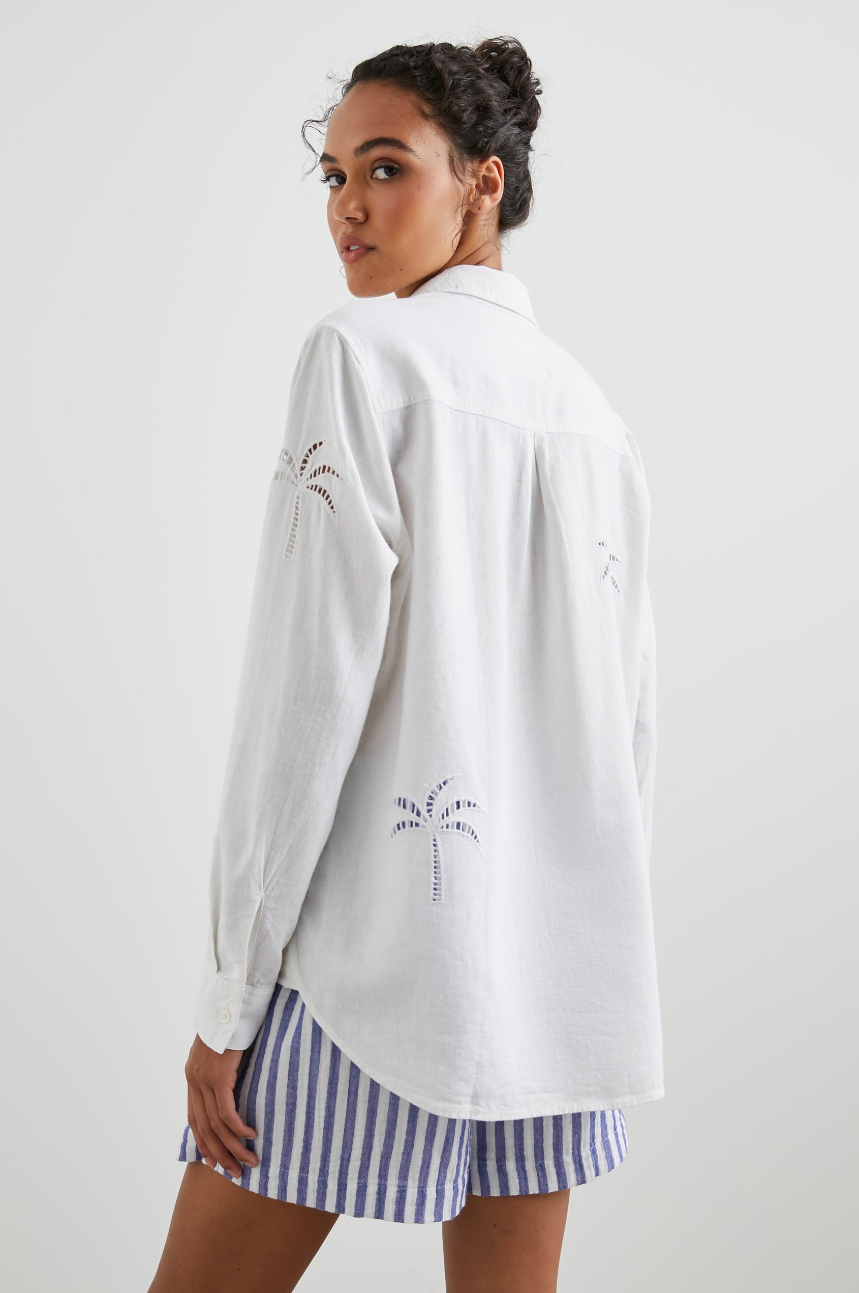 Charli Long-Sleeve Button up with a Chest Patch Pocket in White Palm Tree Eyelet Colorway, with eyelet Palm Trees on white - Back View Featured on Model