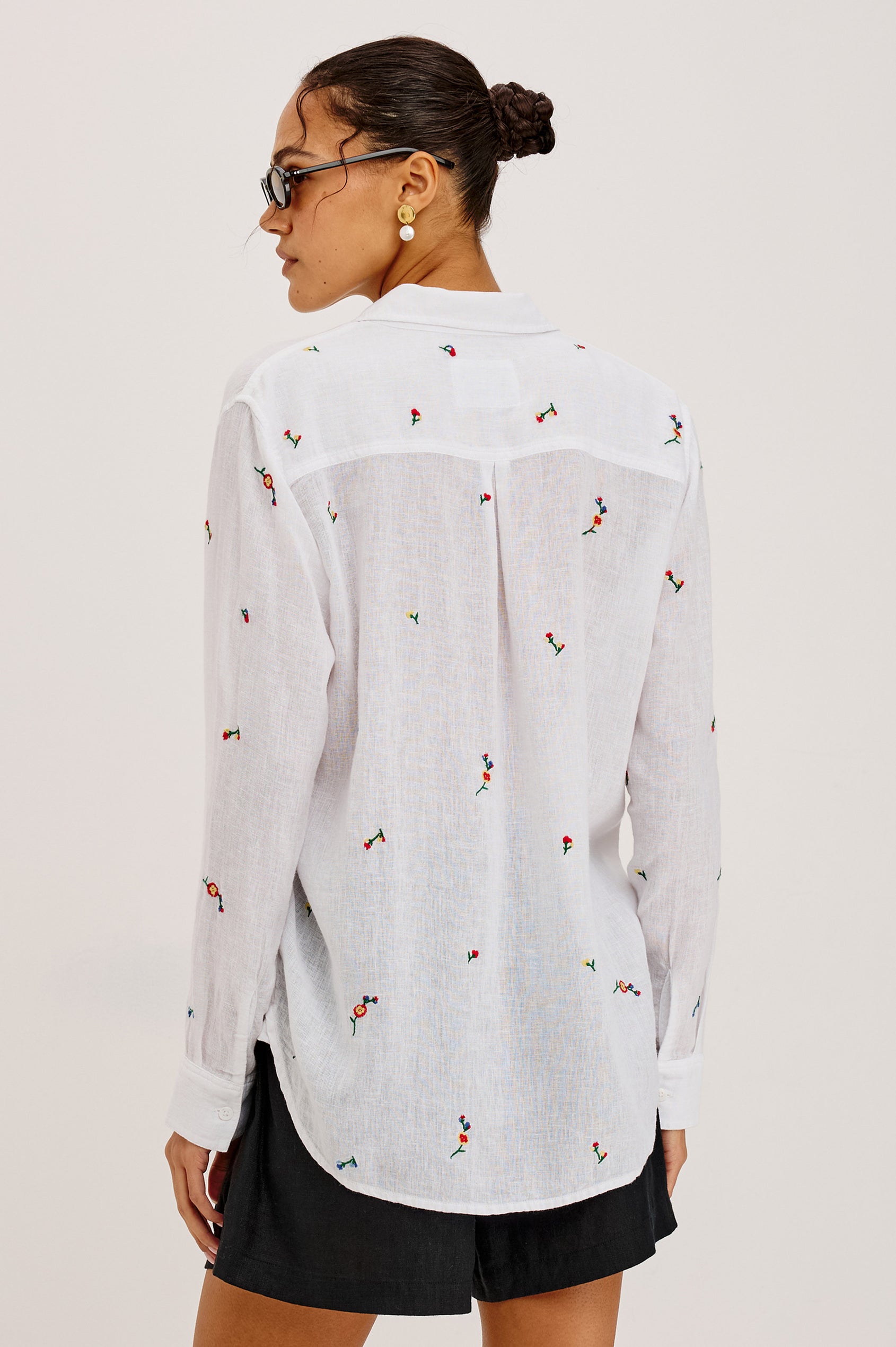 Charli Button-Up Shirt in Linen Blend With Collar, Long Sleeves, Relaxed Fit, and Single Chest Patch Pocket in Wildflower Embroidery Colorway - Upper Body Back View Featured on Model