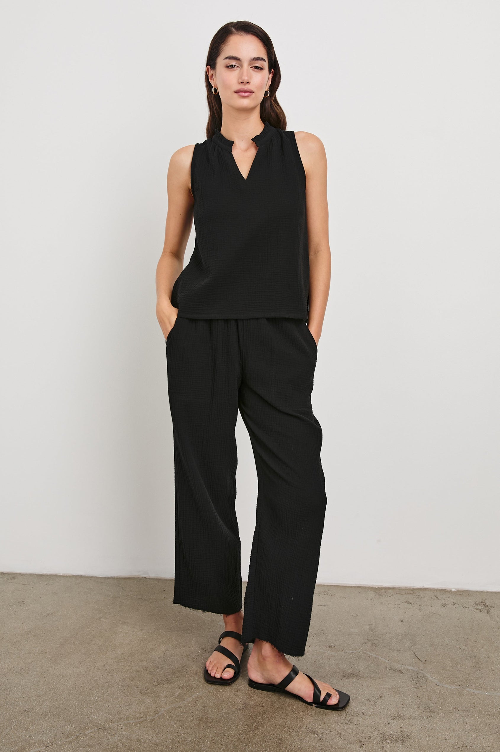 Christy Cotton Gauze Sleeveless Top with Collared V-Neck In Colorway Black - Full Front Body View Featured On Model