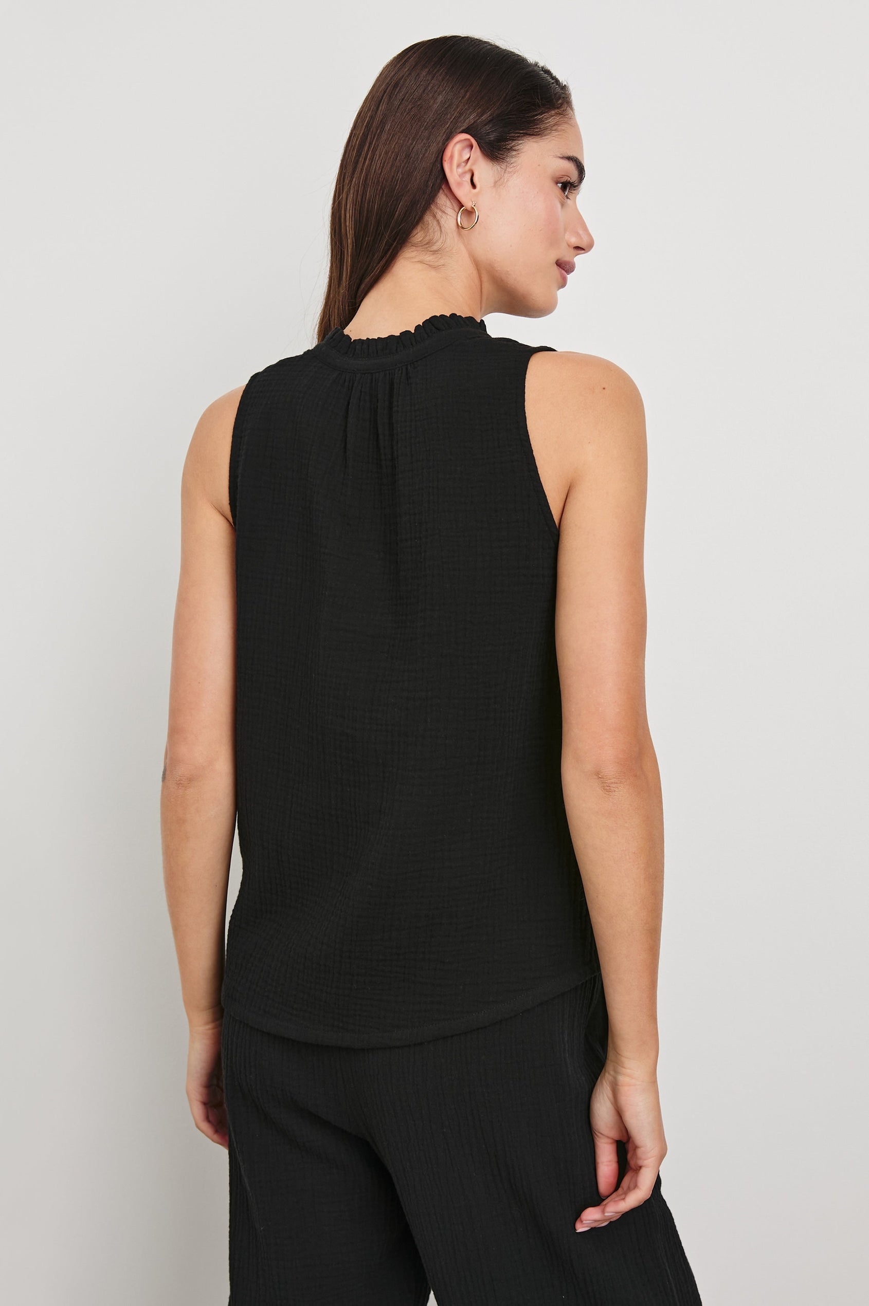Christy Cotton Gauze Sleeveless Top with Collared V-Neck In Colorway Black - Back View Featured On Model