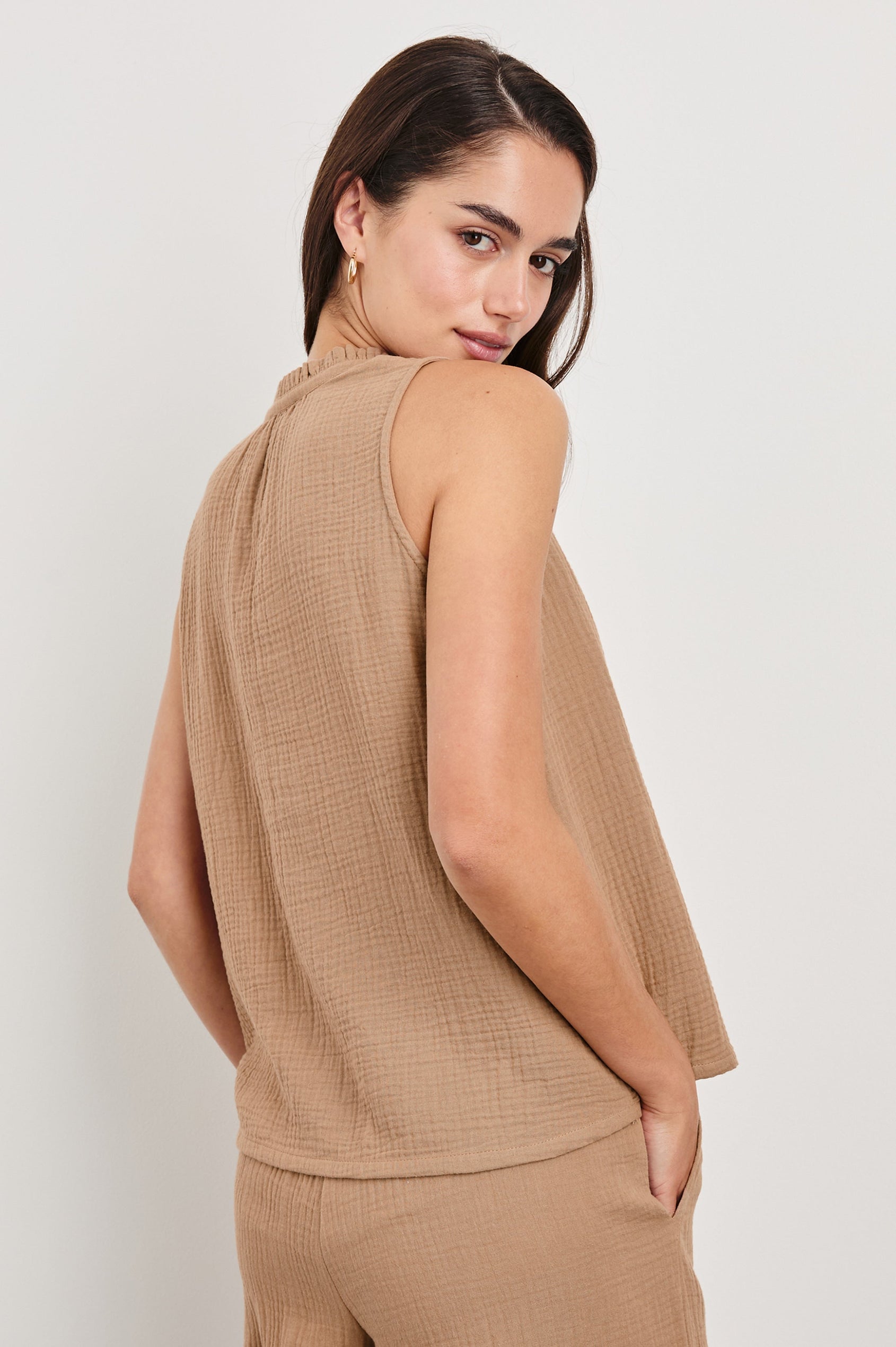 Christy Cotton Gauze Sleeveless Top with Collared V-Neck In Colorway Taupe - Back View Featured On Model