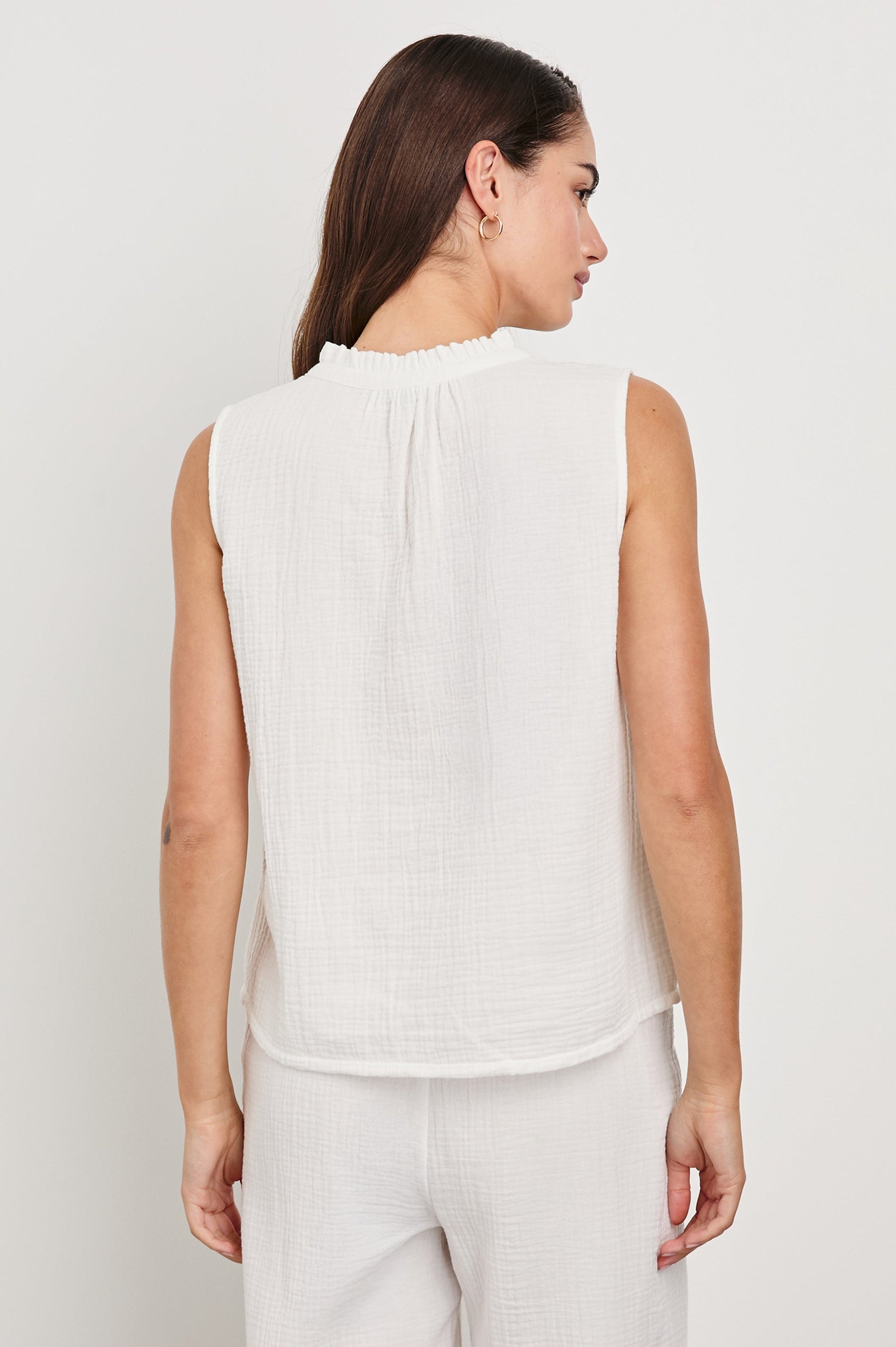 Christy Cotton Gauze Sleeveless Top with Collared V-Neck In Colorway White - Back View Featured On Model