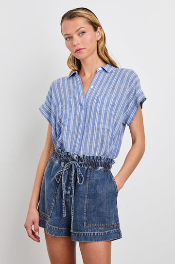 Cito Short-Sleeve Button Down with two Chest Patch Pockets in Lake View Stripe Colorway, Vertical Stripes in Blues and White - Front Tucked View Featured on Model