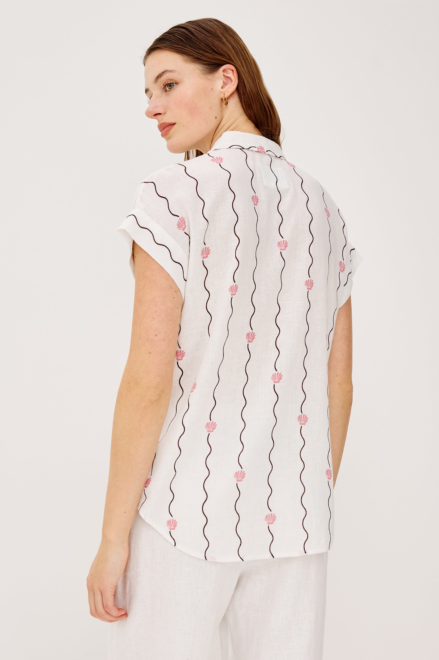 Cito Relaxed Button-Up Shirt in Linen With Collar Chest Patch Pockets and Cuffed Cap Sleeves in Striped Seashells Colorway - Upper Body Front View Featured on Model