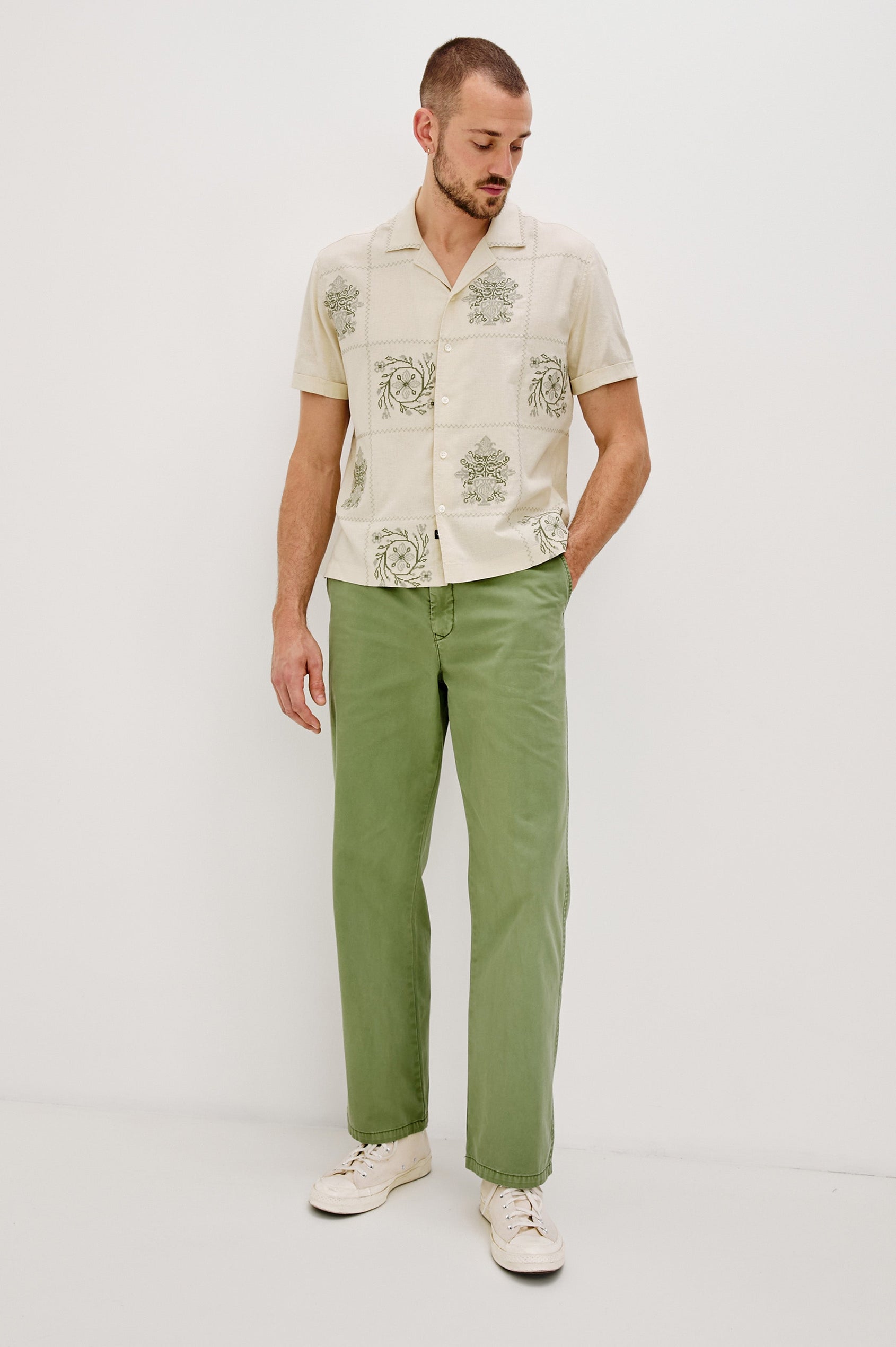 Clairo Button Front Shirt with a Relaxed Lapel, Cuffed Short Sleeves and Embroidery throughout in Cream Quilt Squares Colorway. Full Body Front View Shown on Model.