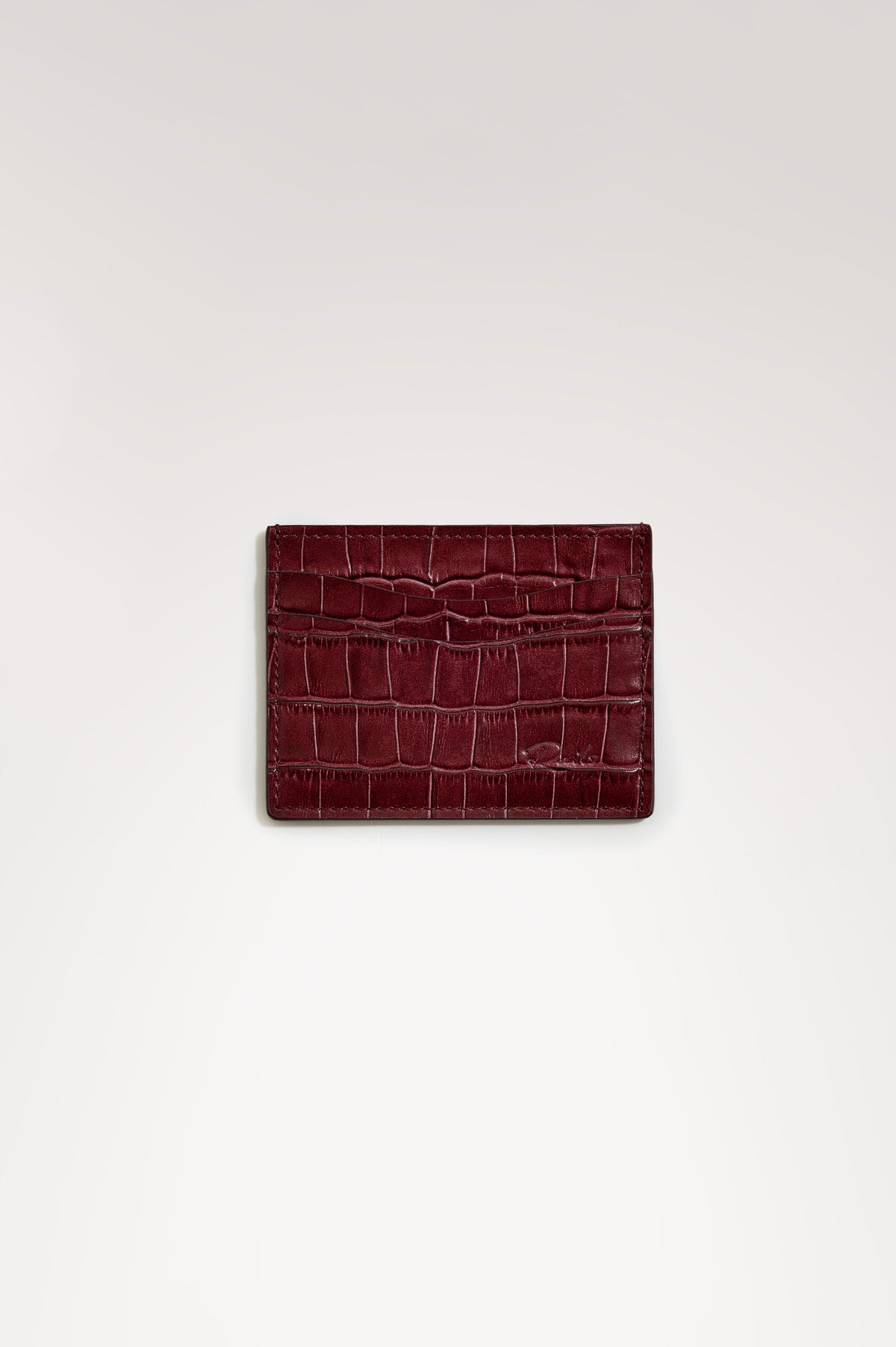Classic Card Holder in Croc-Embossed Spanish Leather With Top Pocket, Two Front Slip Pockets, and Embossed Rails Logo in Burgundy Croc Embossed Colorway -