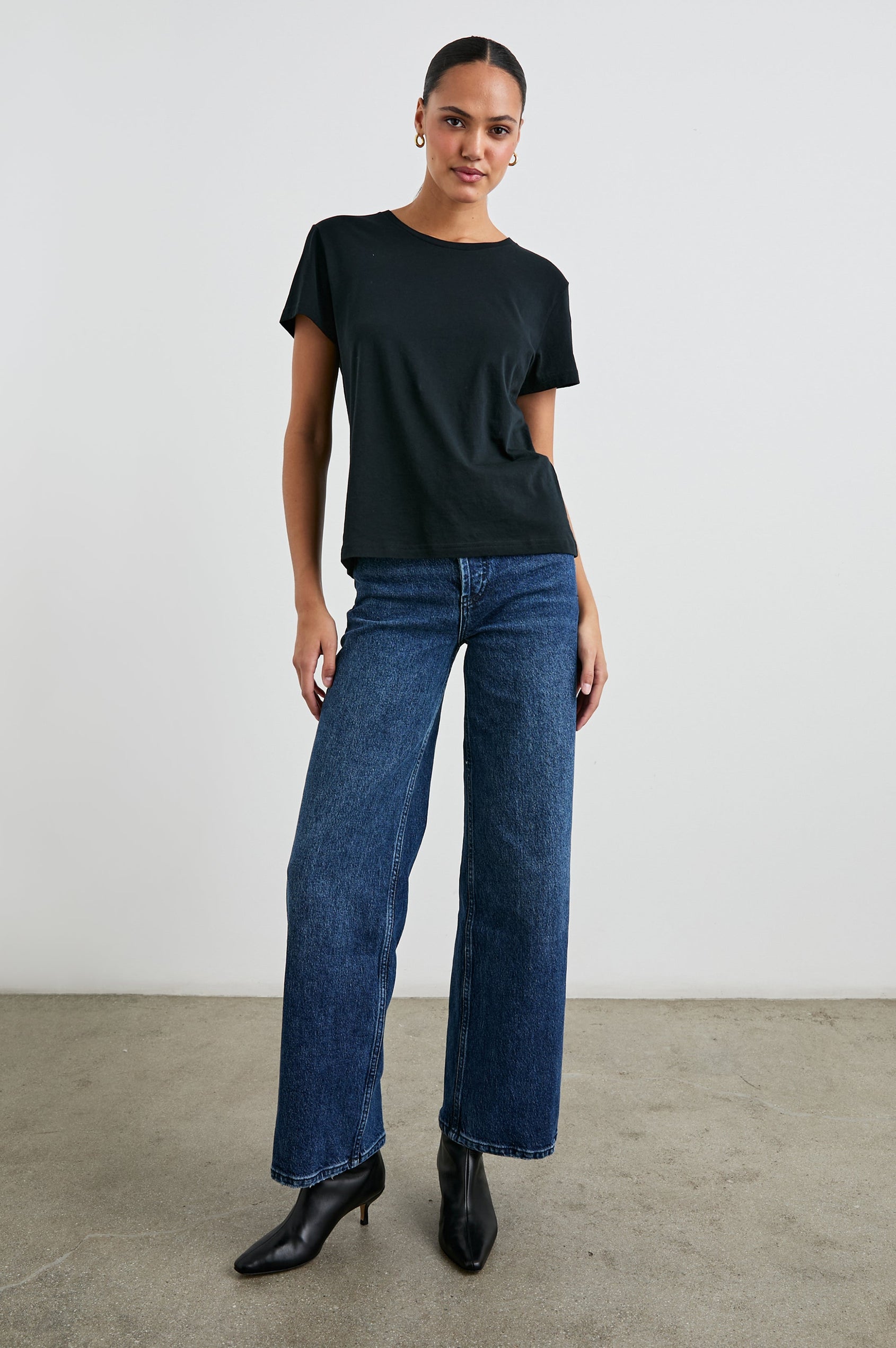 Classic Short Sleeve Crew Neck T-Shirt in Black Colorway - Front Full Body View Featured on Model
