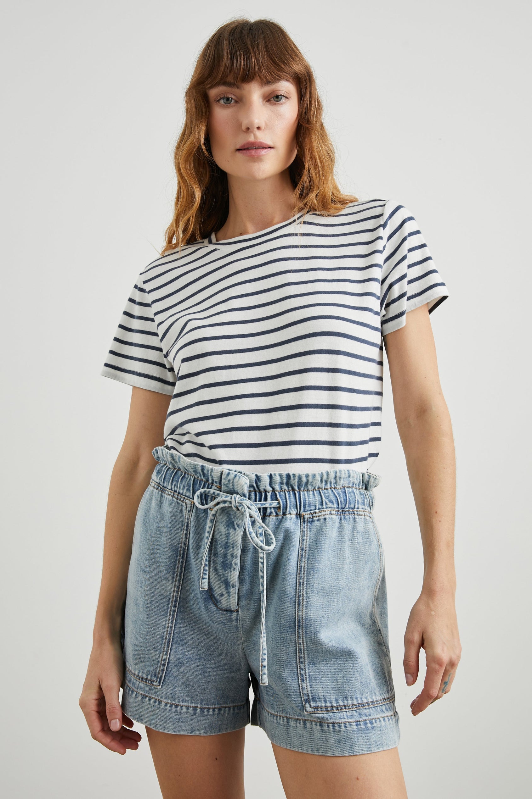 Classic Short Sleeve Crew Neck T-Shirt in Ivory Navy Stripe Colorway, Horizontal Stripes - Front Tucked View Featured on Model
