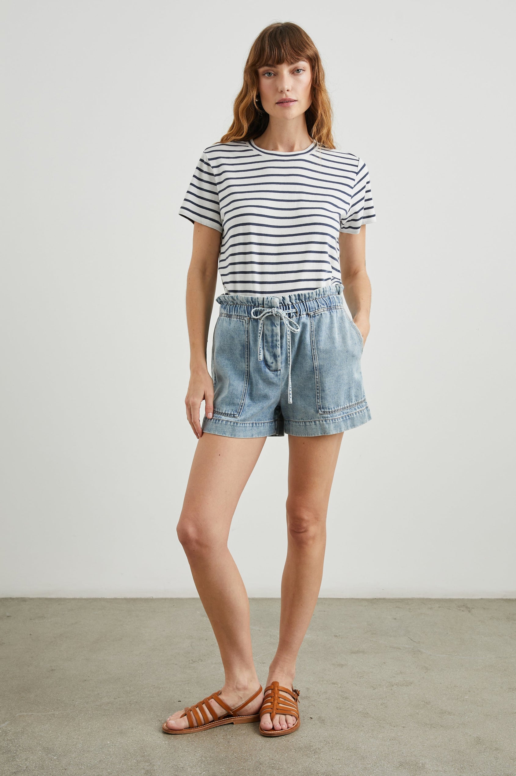 Classic Short Sleeve Crew Neck T-Shirt in Ivory Navy Stripe Colorway, Horizontal Stripes - Front Tucked Full Body View Featured on Model