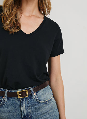 Classic Short Sleeve V Neck T-Shirt in Black Colorway - Front Tucked View Featured on Model