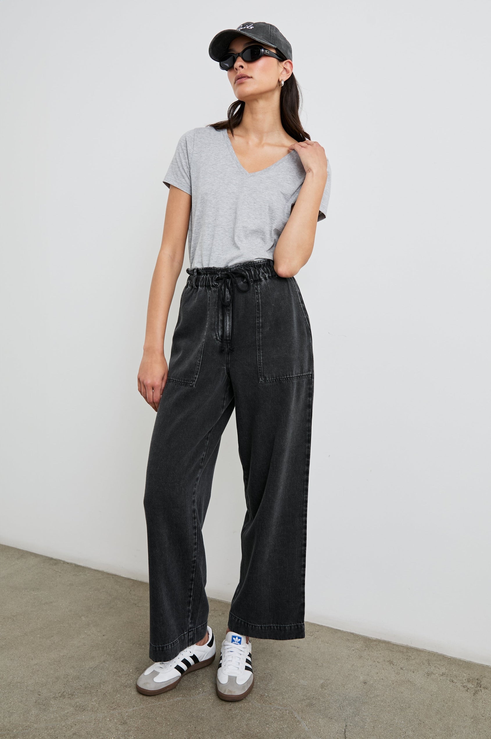 Classic Short Sleeve V Neck T-Shirt in Heather Grey Colorway - Front Tucked Full Body View Featured on Model