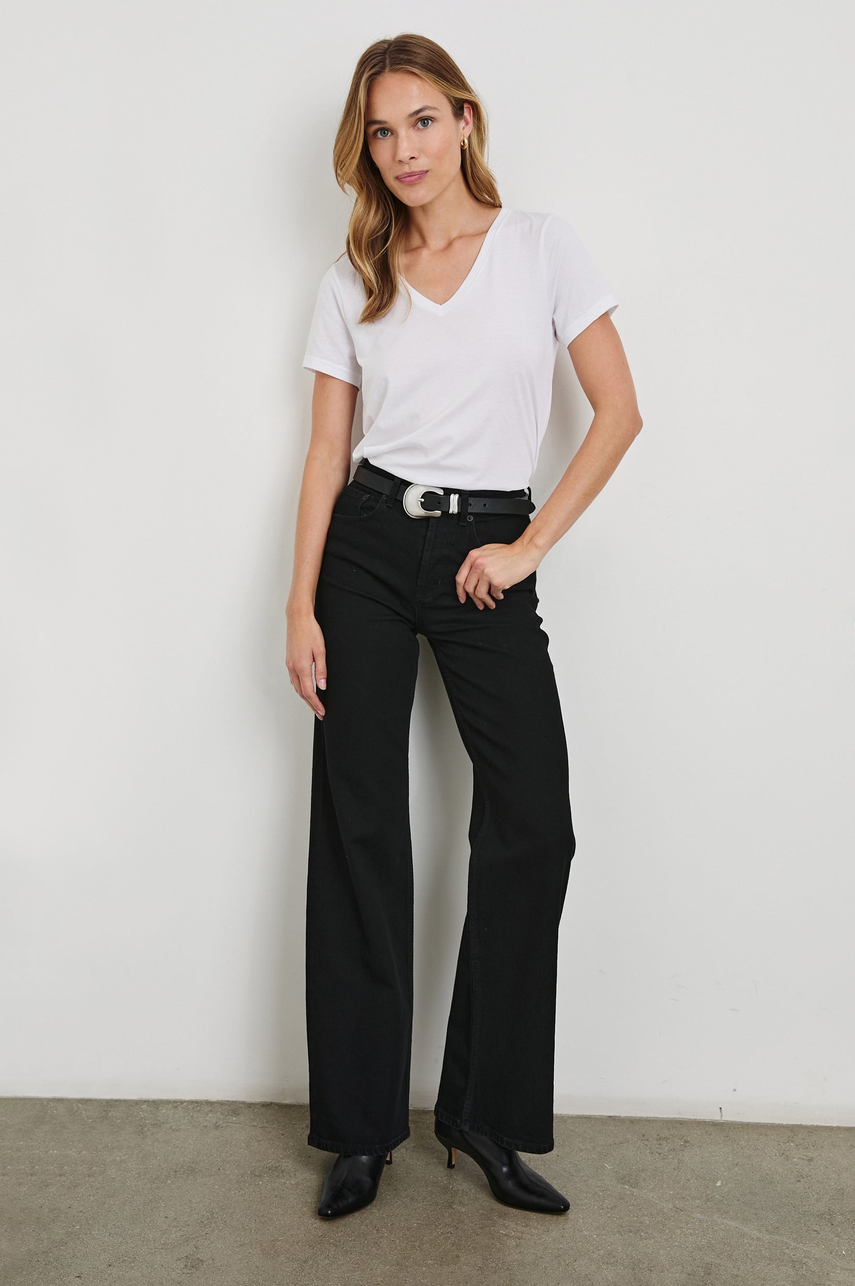 Classic Short Sleeve V Neck T-Shirt in White Colorway - Front Tucked Full Body View Featured on Model