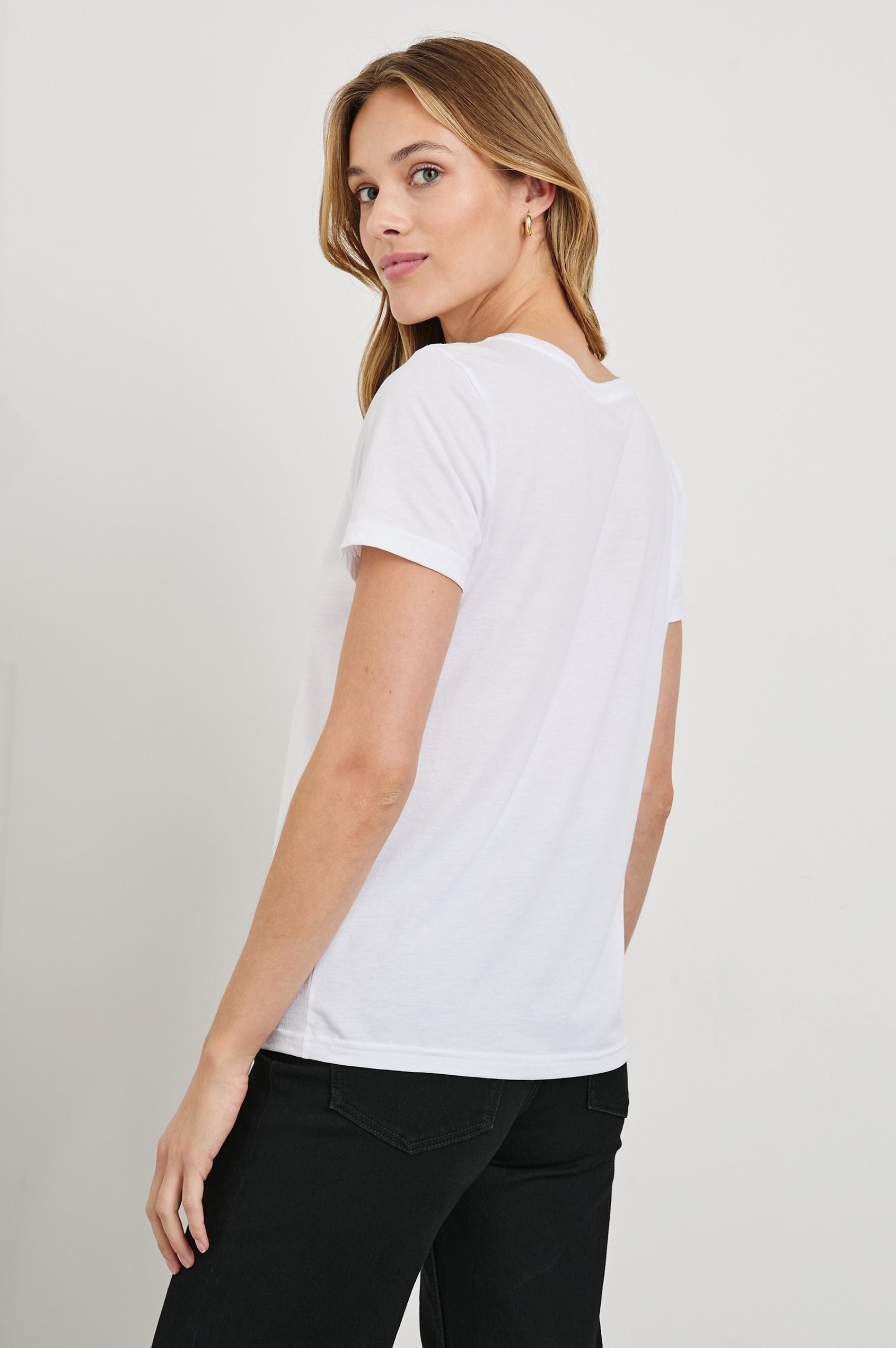 Classic Short Sleeve V Neck T-Shirt in White Colorway - Back View Featured on Model