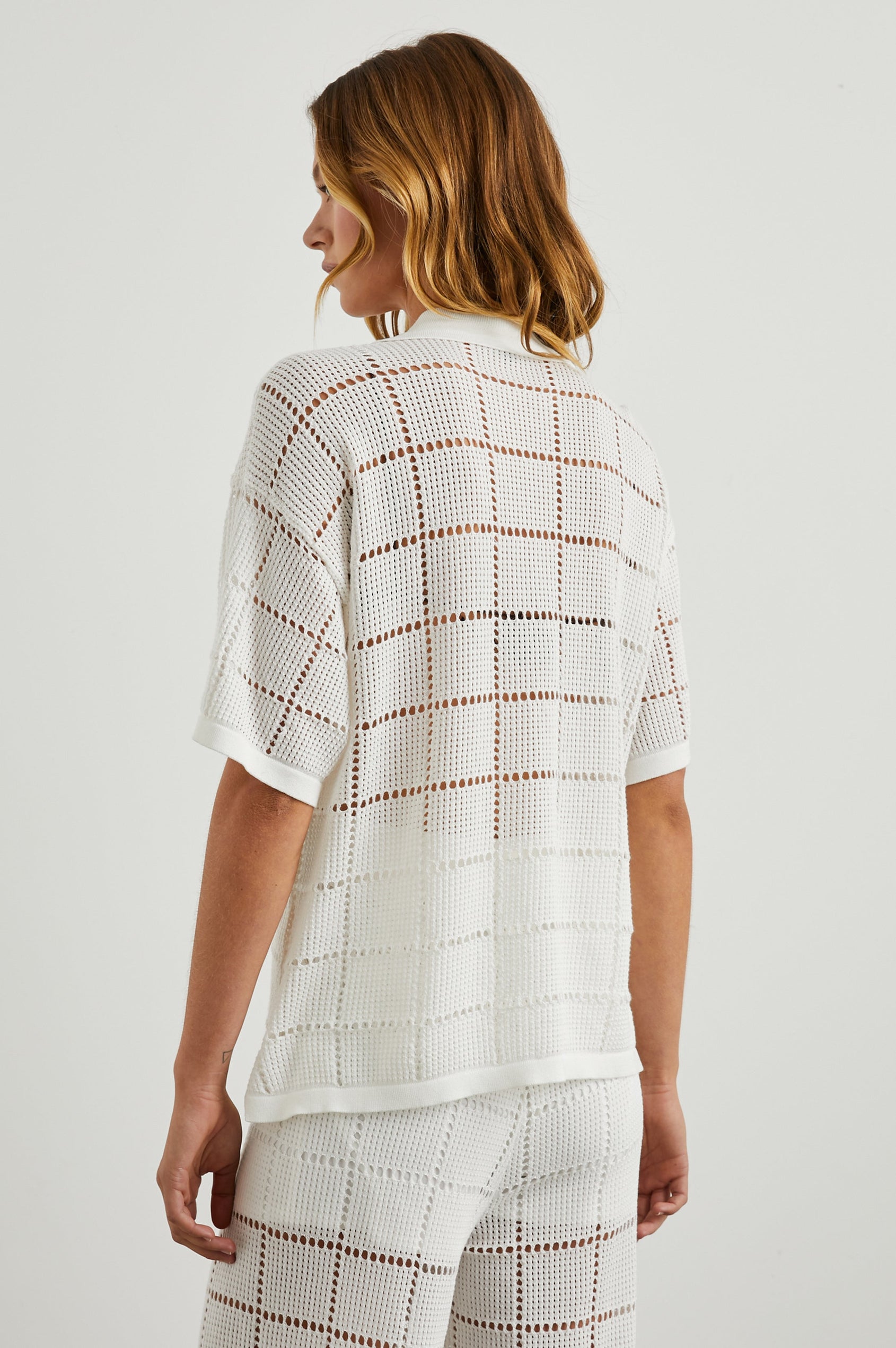 Clemente Short Sleeve Button Up with an Open Knit Grid Pattern in White Colorway - Back View Featured on Model