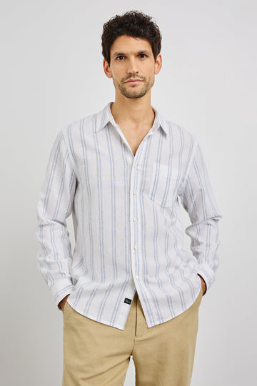 Clyde Collared Button Front Shirt with Long Sleeves and a Chest Pocket in White Azure Colorway. Front View Shown on Model.