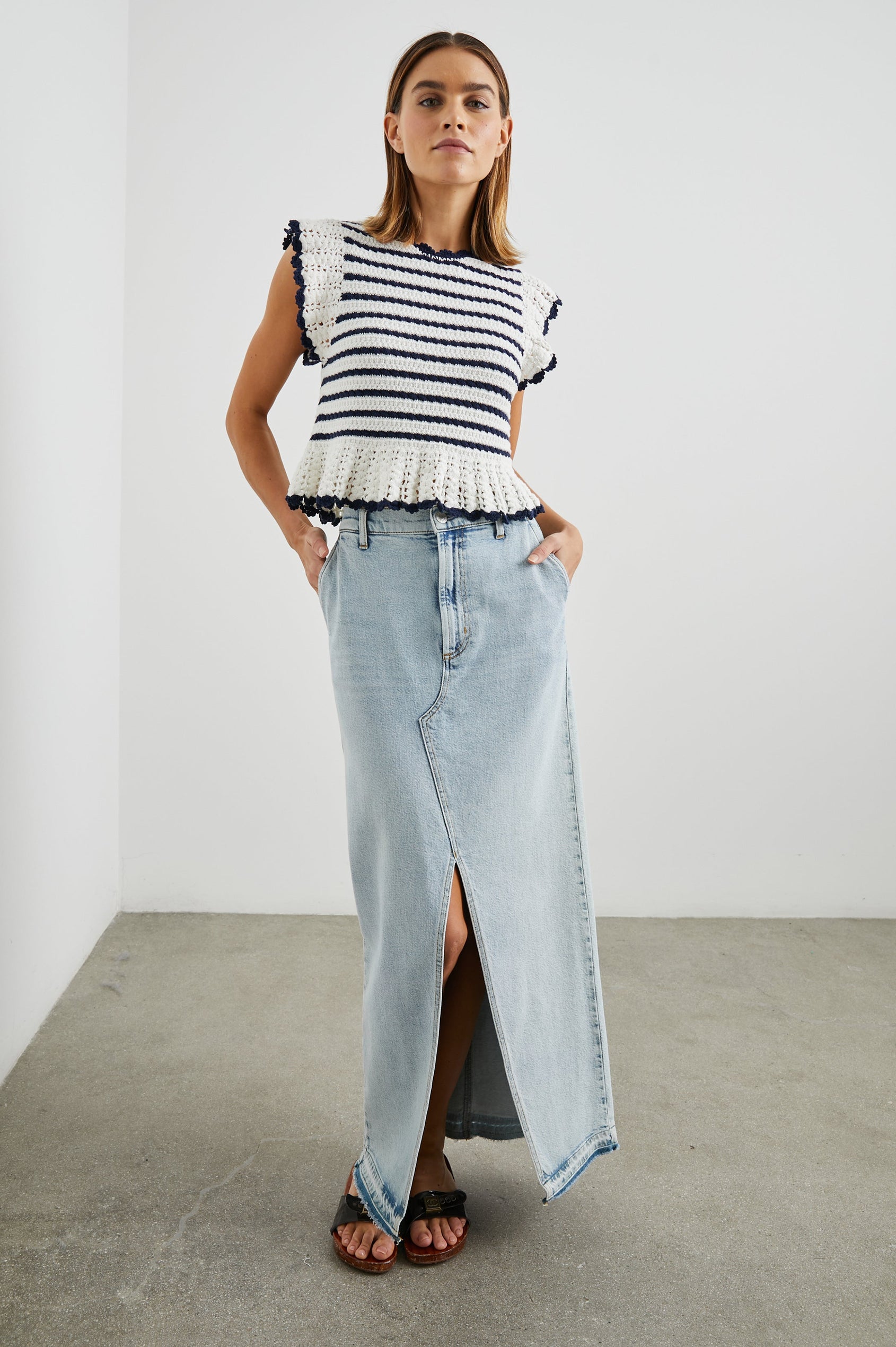 Coen Crochet Knit Short-Sleeve Top with Flared Sleeves and a Back Keyhole Tie in Anadia Stripe Colorway, with Navy and White Horizontal stripes - Front Full Body View Featured on Model