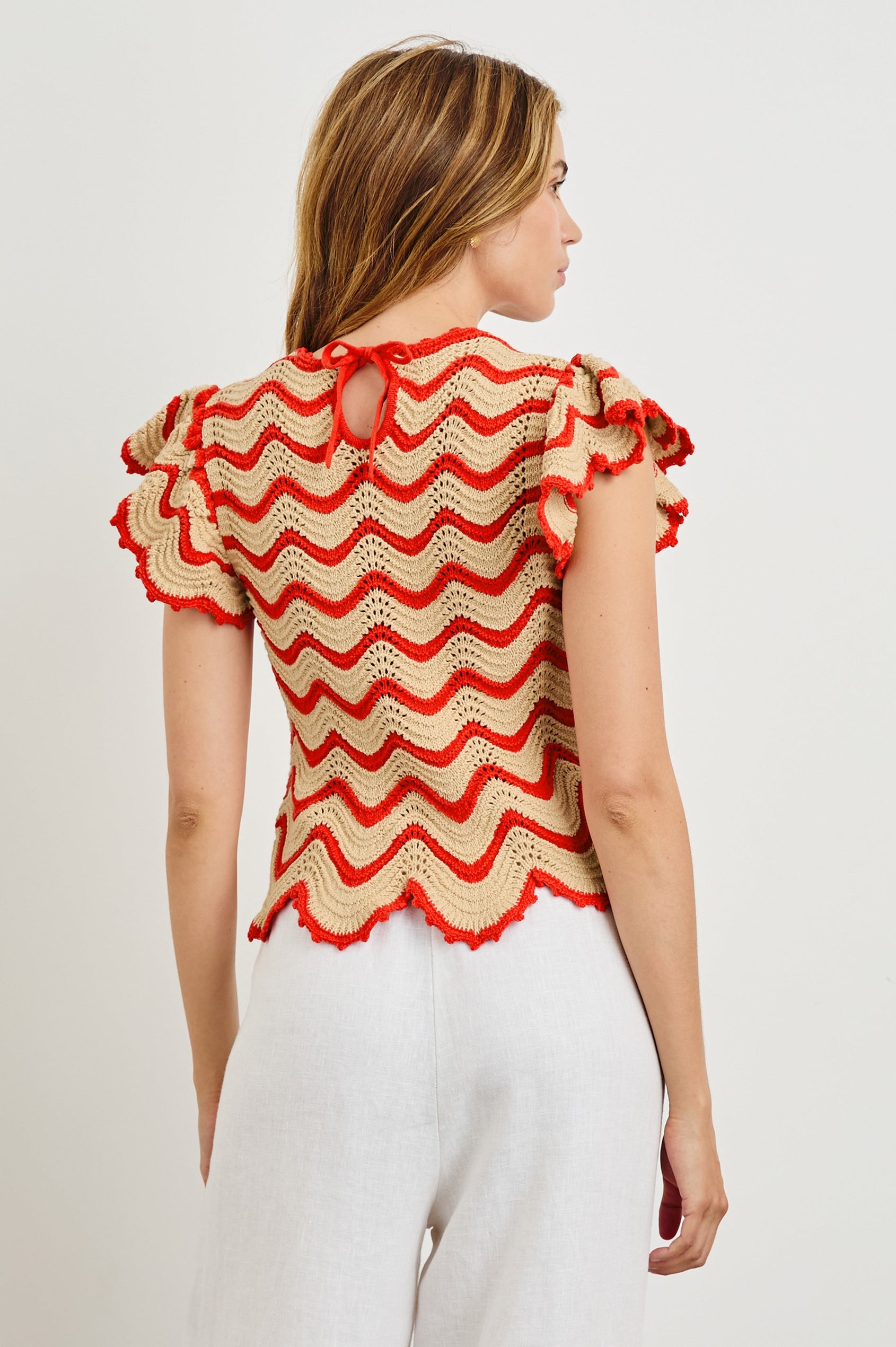 Coen Crochet Knit Short-Sleeve Top with Flared Sleeves and a Back Keyhole Tie in Cherry Oat Stripe Colorway, Horizontal Wavy Stripes - Back View Featured on Model