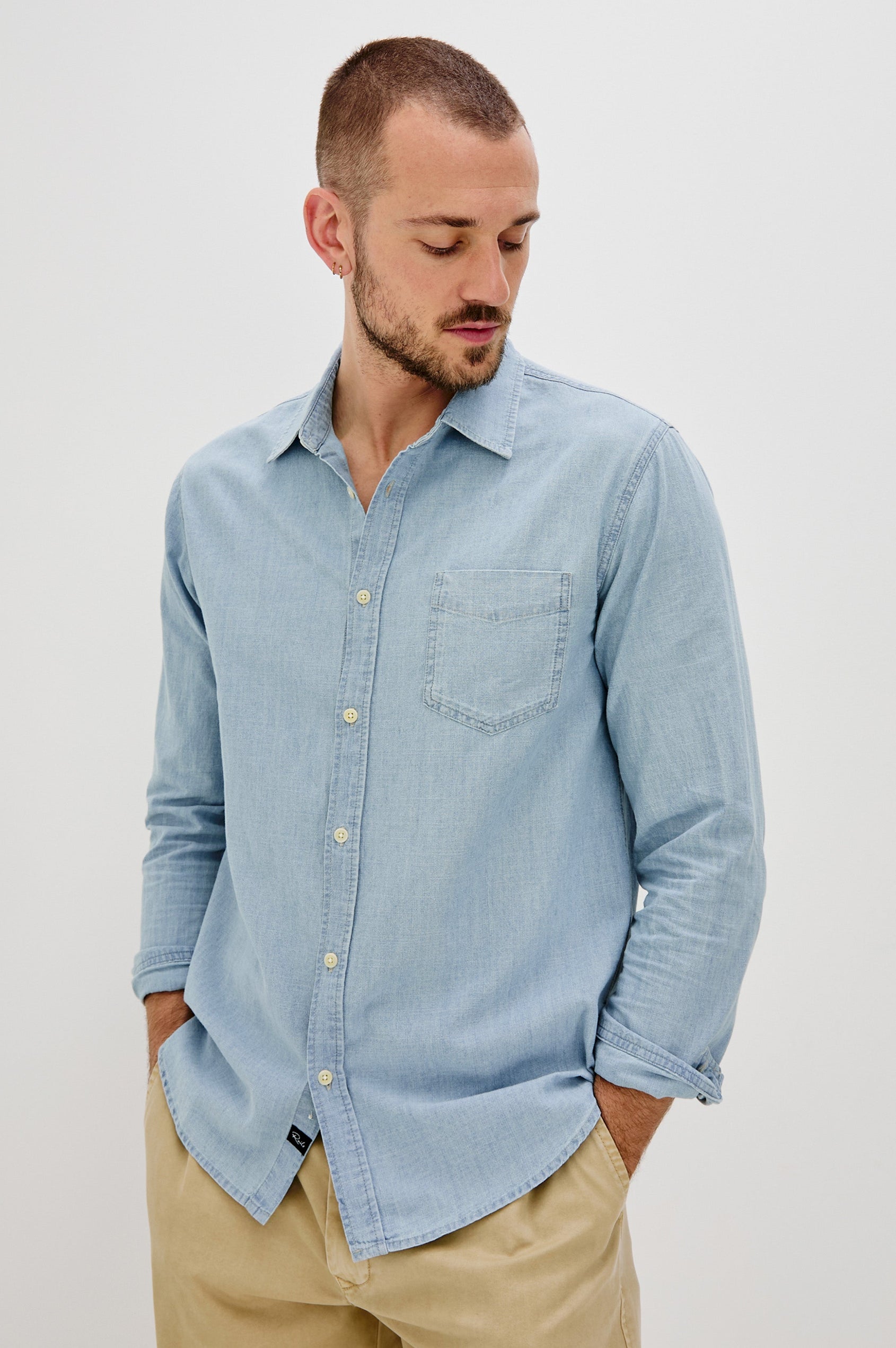 Colton Long-Sleeve Denim Button Up with a Chest Patch Pocket in Medium Vintage Wash Colorway - Front View Featured on Model 