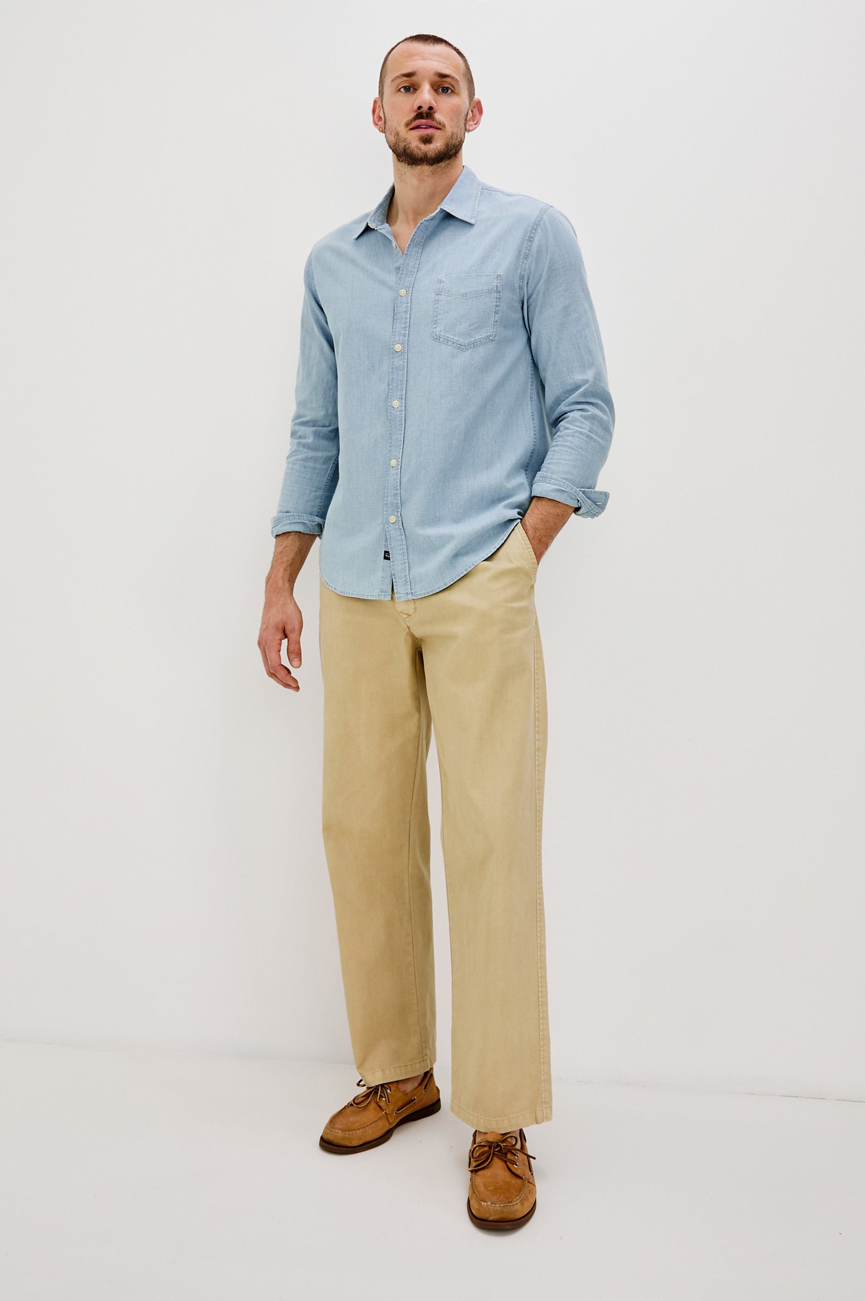 Colton Long-Sleeve Denim Button Up with a Chest Patch Pocket in Medium Vintage Wash Colorway - Full Body front View Featured on Model 