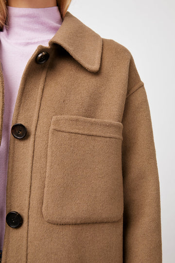 Connie Shirt Jacket with Button Closure, Two Front Pockets and Two Chest Patch Pockets in Camel Colorway - Front View Featured on Model 