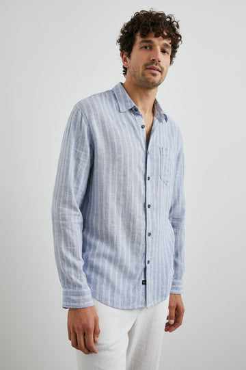 Connor Long-Sleeve Button Up with a Chest Patch Pocket in Denim White Pinstripe Colorway - Front View Featured on Model