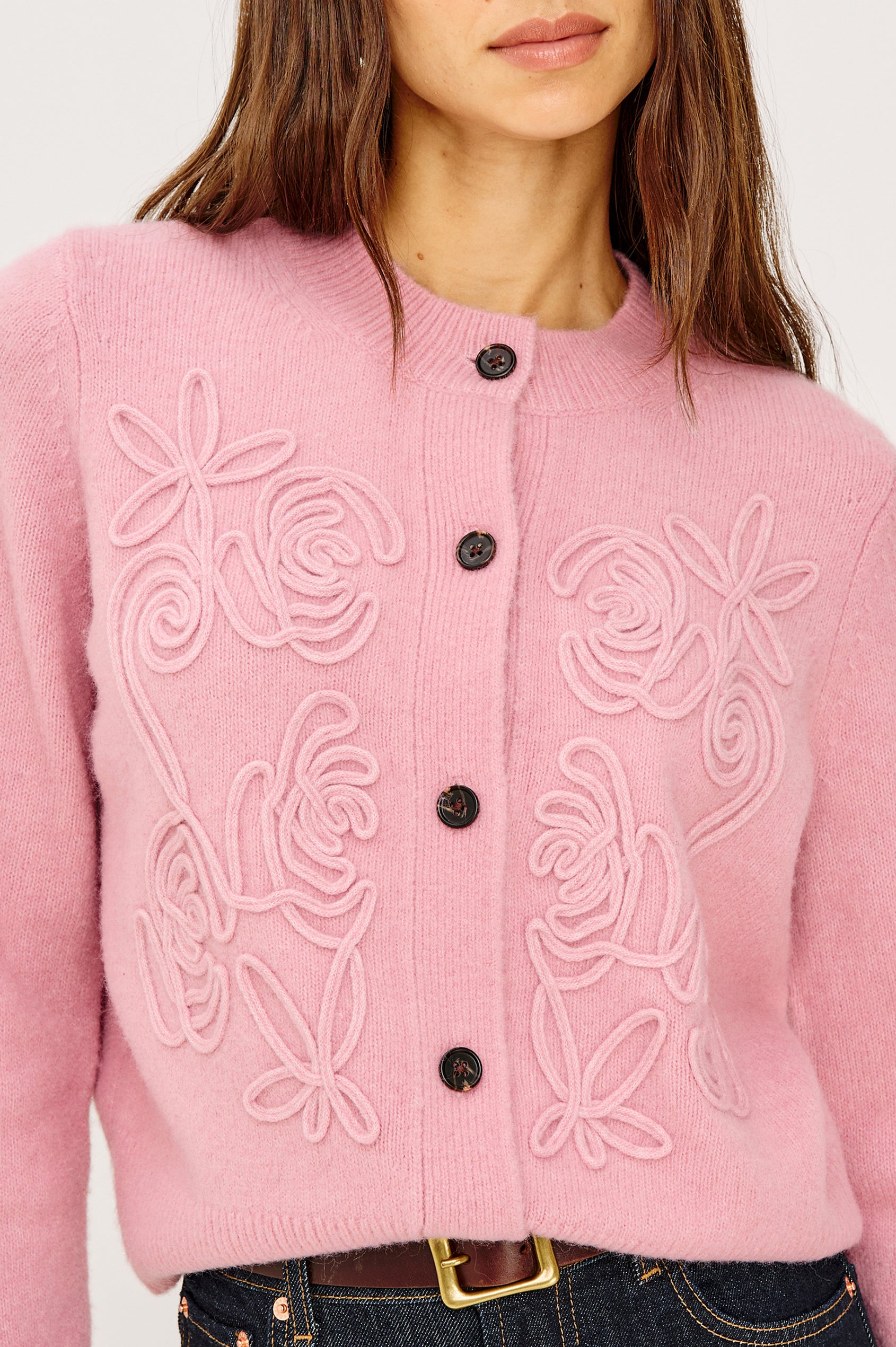 Coralee Cardigan in Alpaca Knit With Soutache Rosette Front Detailing, a Crew Neckline, Front Buttons, Ribbed Trim, and Long Sleeves in Ballet Colorway - Upper Body Close Up View Featured on Model